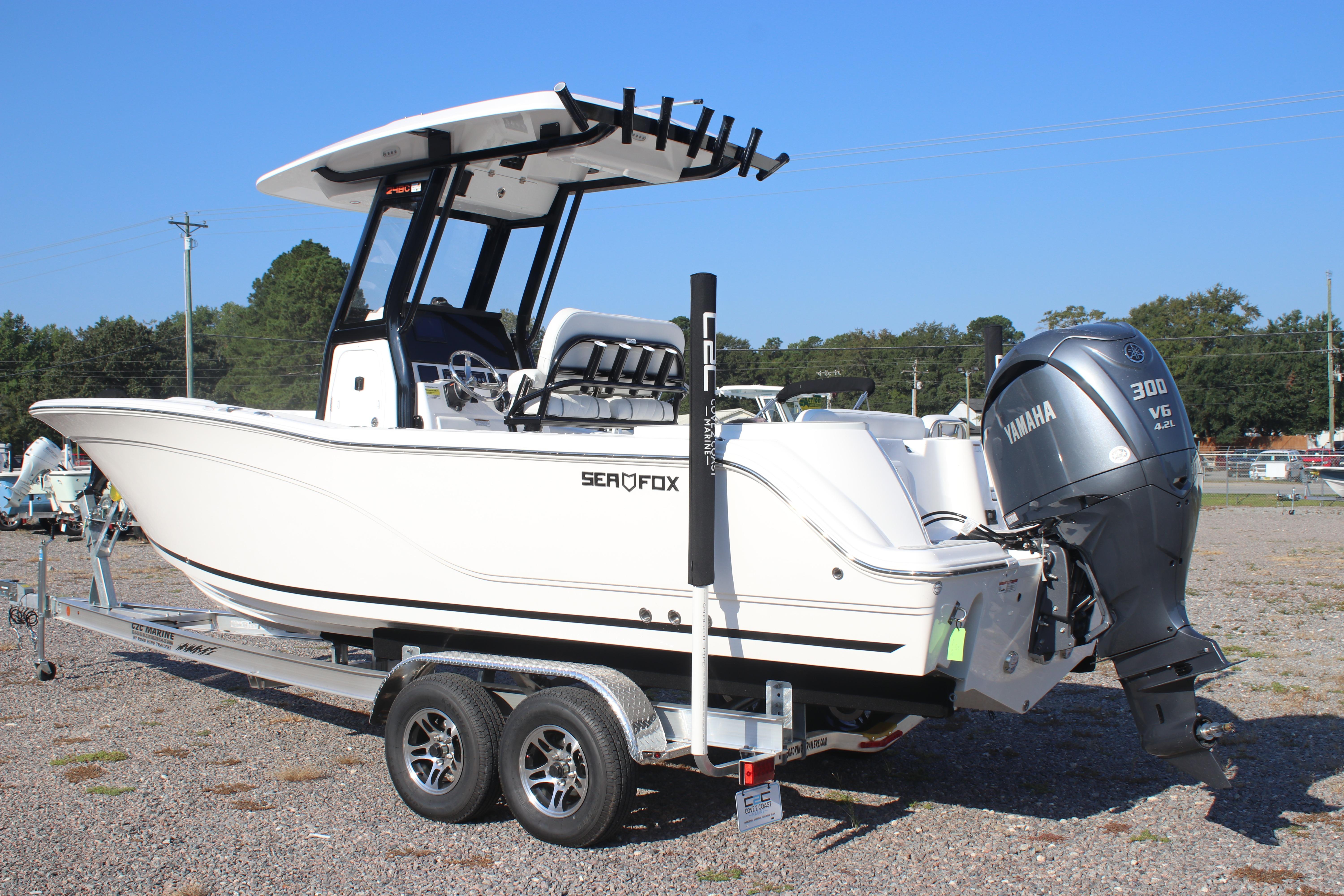 2026 Sea Fox 248 Commander boat on trailer with Yamaha 300 V6 engine.