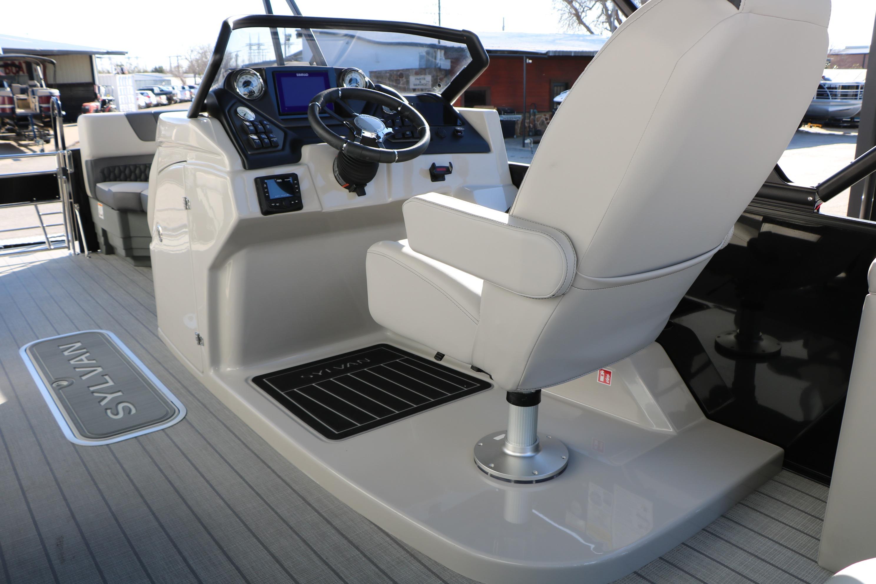 Interior of 2026 Sylvan L3 CLZ DH boat with modern helm and seating.
