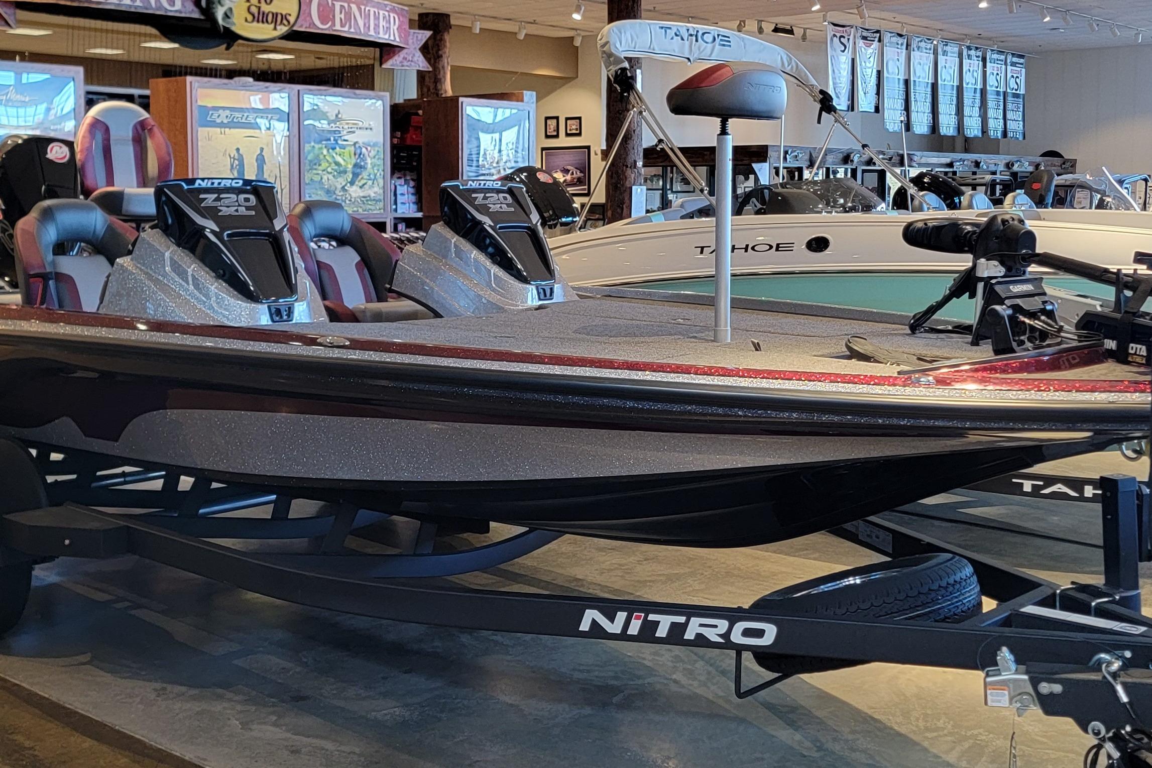 2025 Nitro Z20 XL Pro bass boat displayed in showroom, featuring sleek design and advanced features.