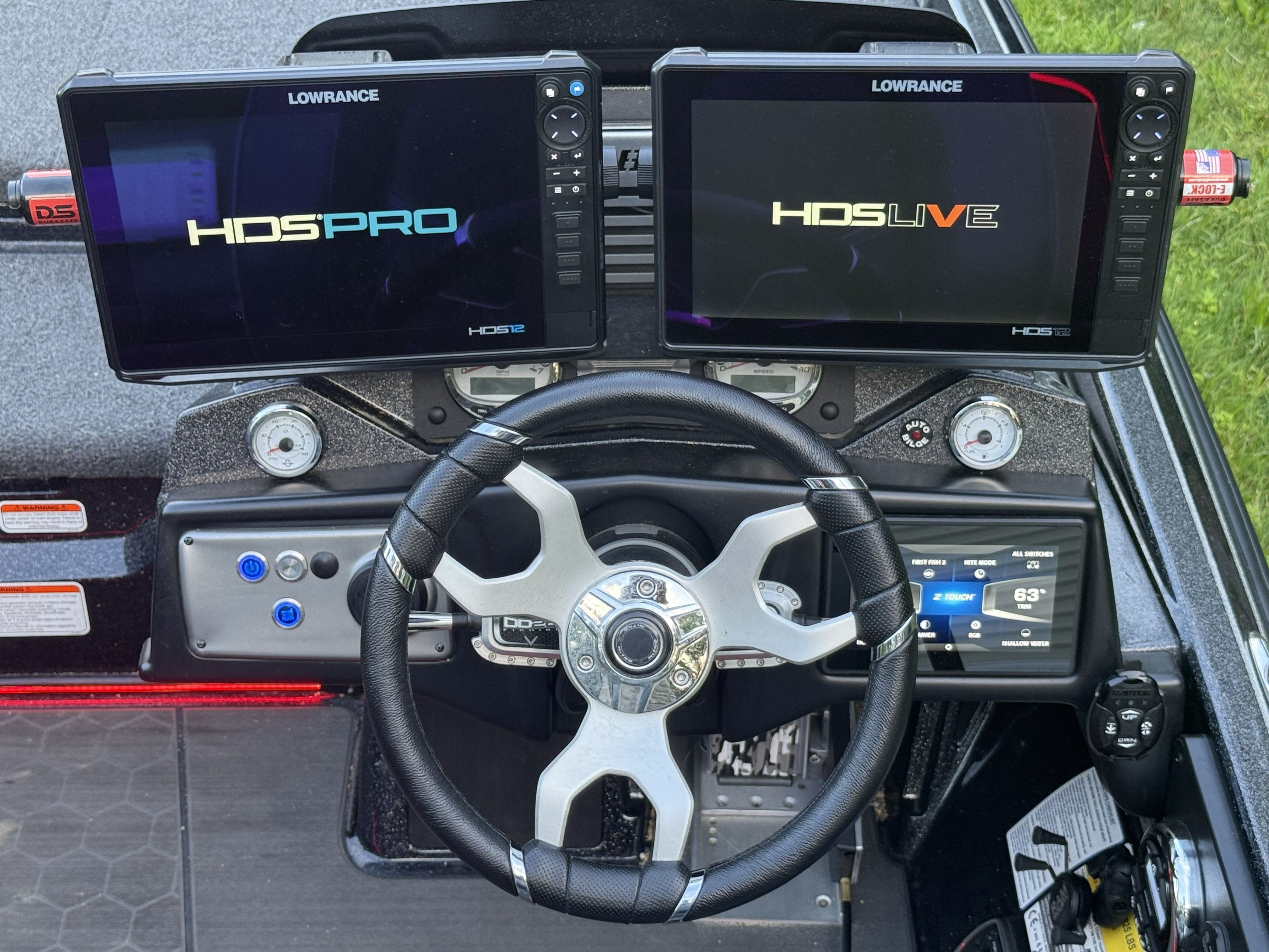 Dashboard of a 2023 Nitro Z21 XL Pro with two large screens and a modern steering wheel.