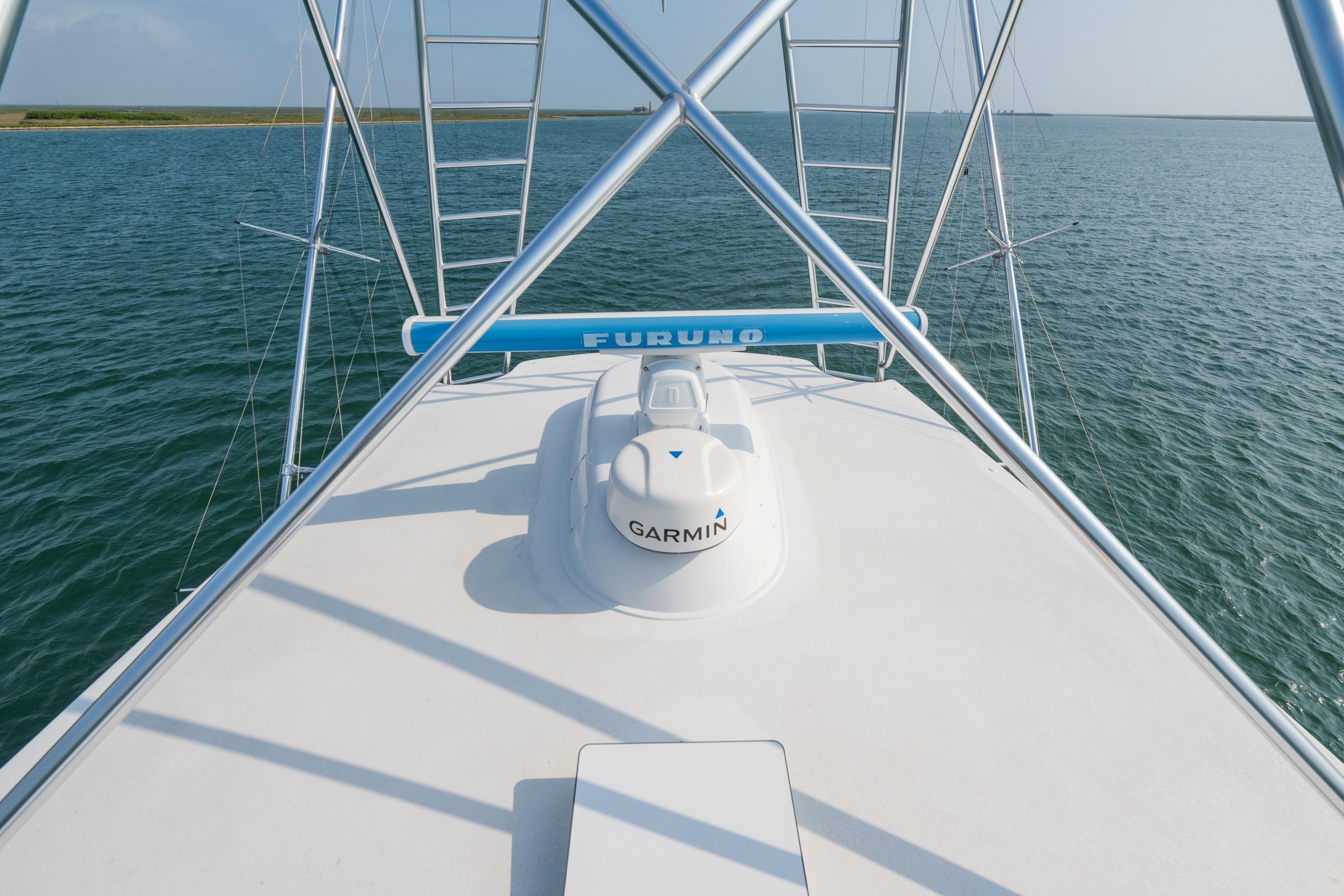2005 Viking Convertible boat with Garmin and Furuno equipment on open water.