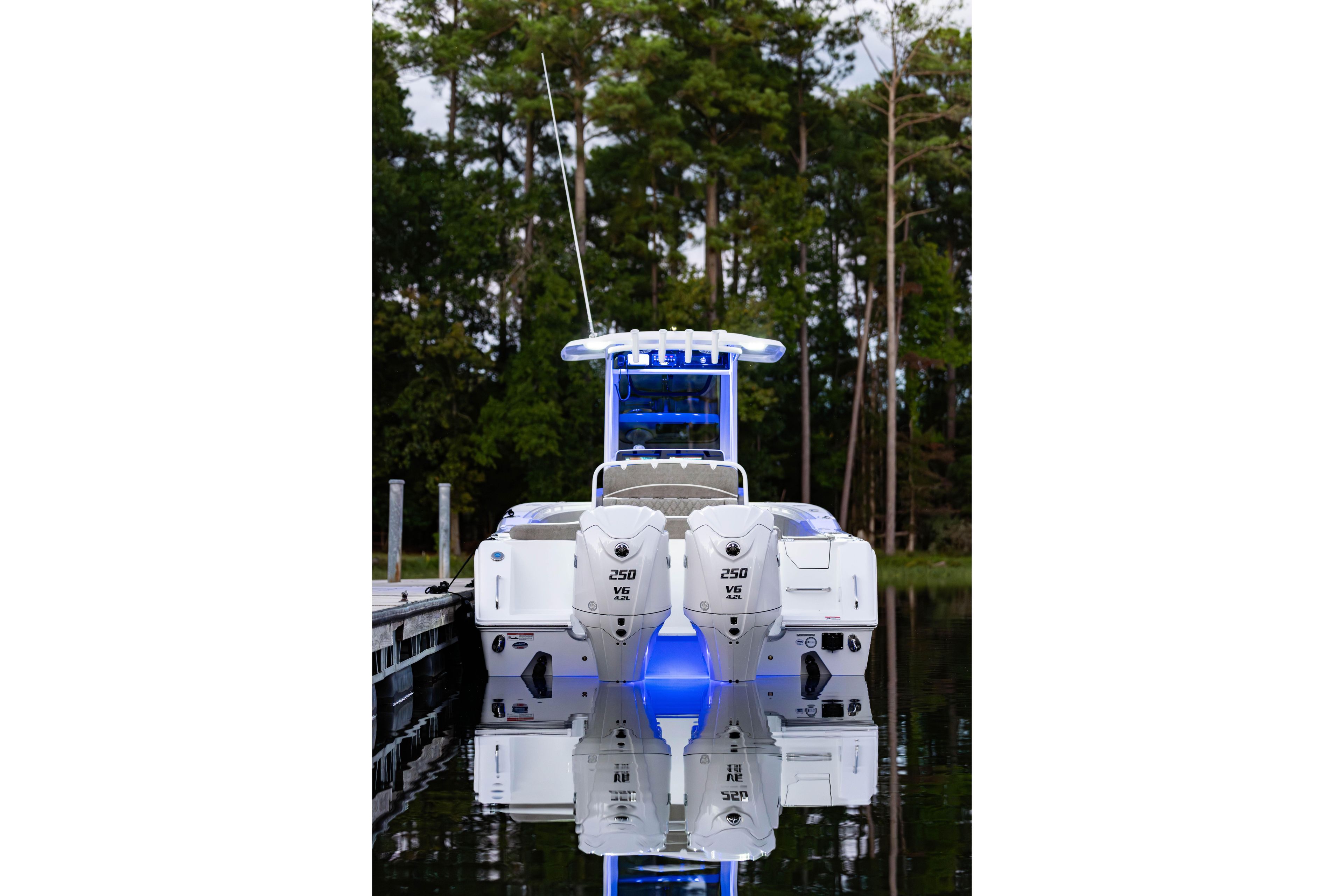 2026 Sea Hunt Ultra 275 Coffin Box boat docked, featuring dual 250 V6 engines.