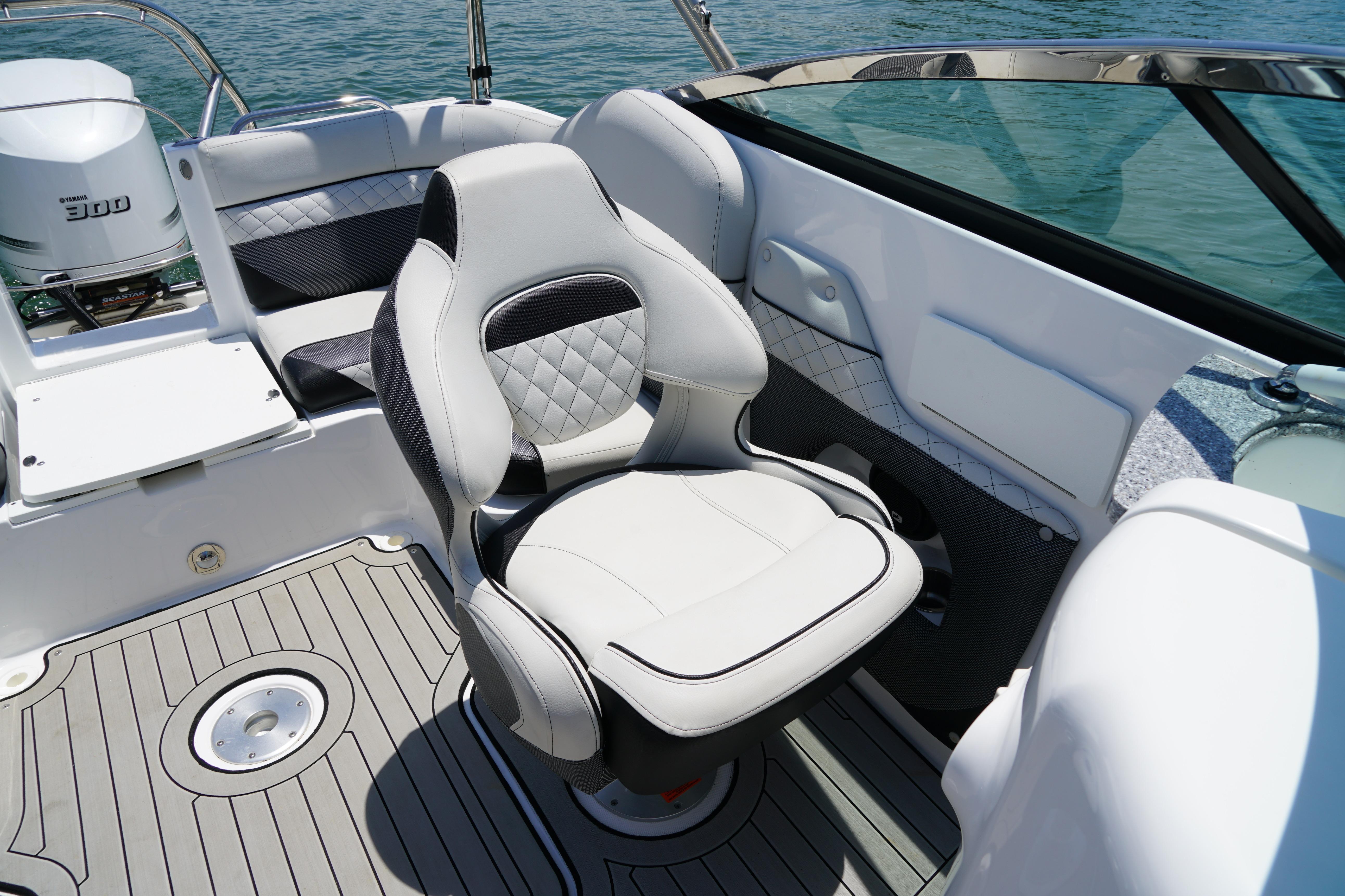 2020 Hurricane SunDeck 2486 OB boat interior with luxury seating and Yamaha 300 outboard motor.