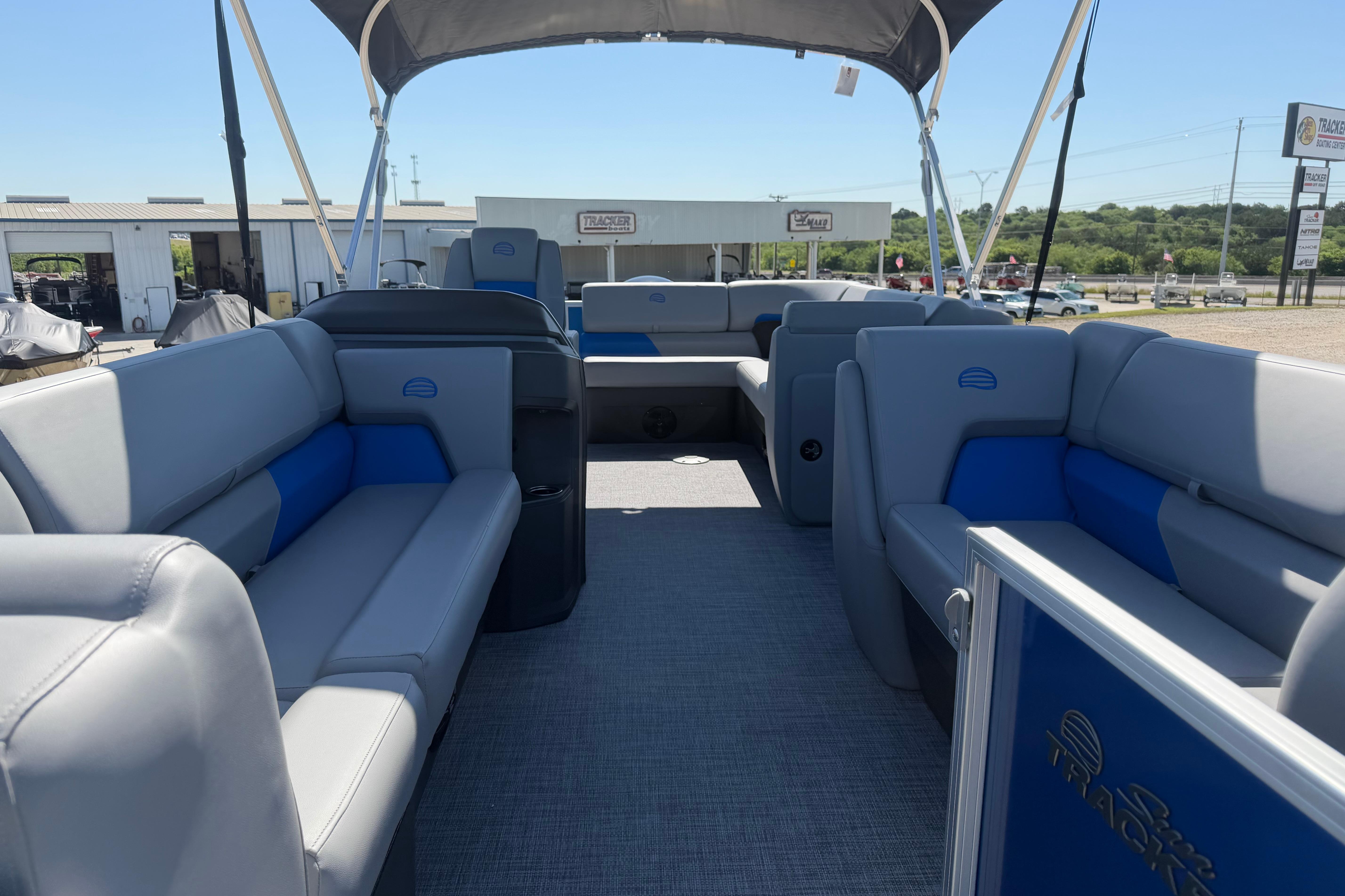 2026 Sun Tracker Party Barge 20 DLX interior with spacious seating and canopy.