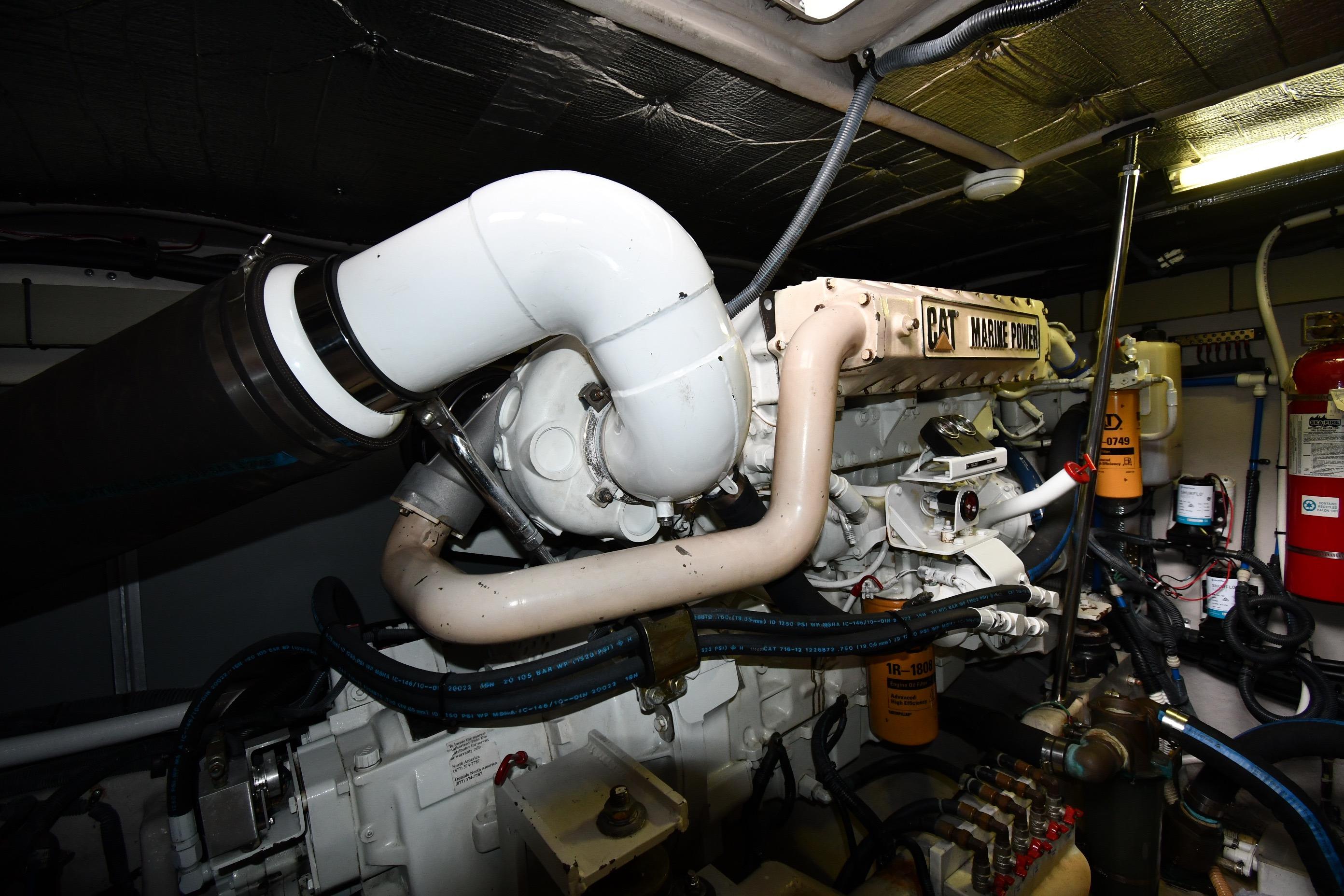 Engine room of 2001 Sea Ray 540 Sundancer with CAT Marine Power engine.