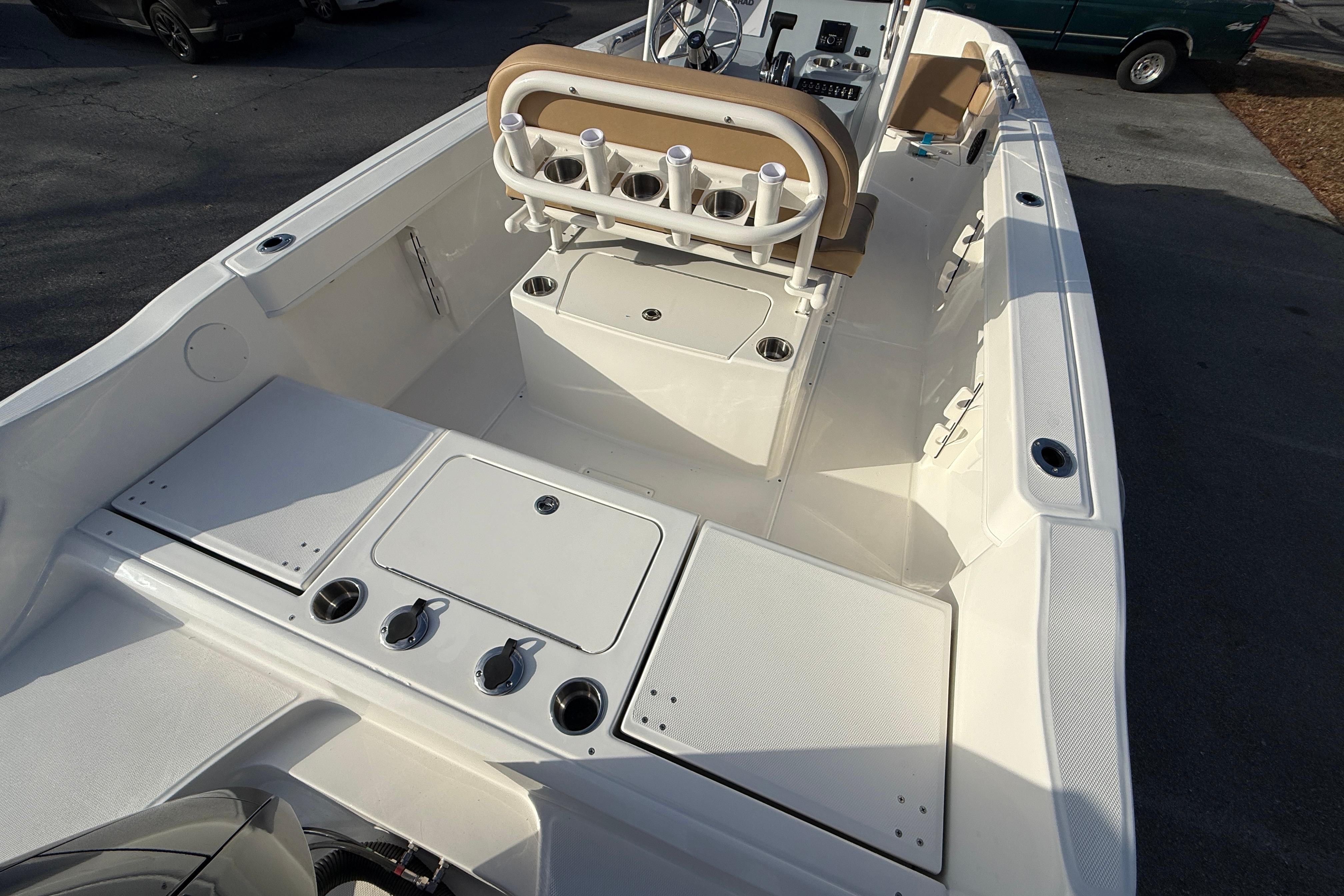 2026 Bayliner Trophy T22CC boat interior with seating and storage compartments.