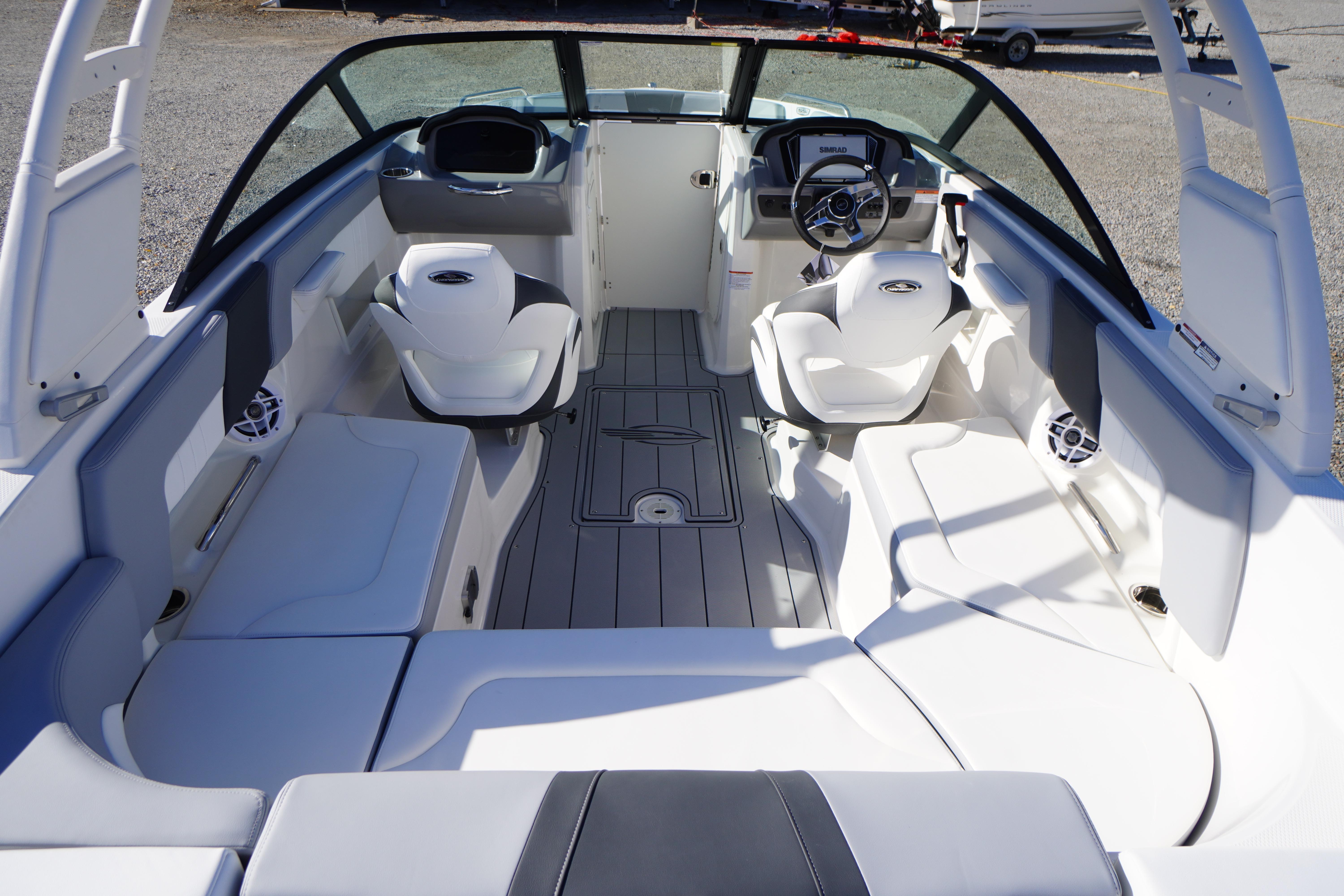2026 Chaparral 23 SSi OB boat interior with modern seating and steering console.