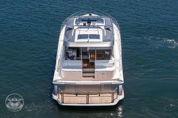 2025 Riviera 645 SUV luxury yacht on open water.