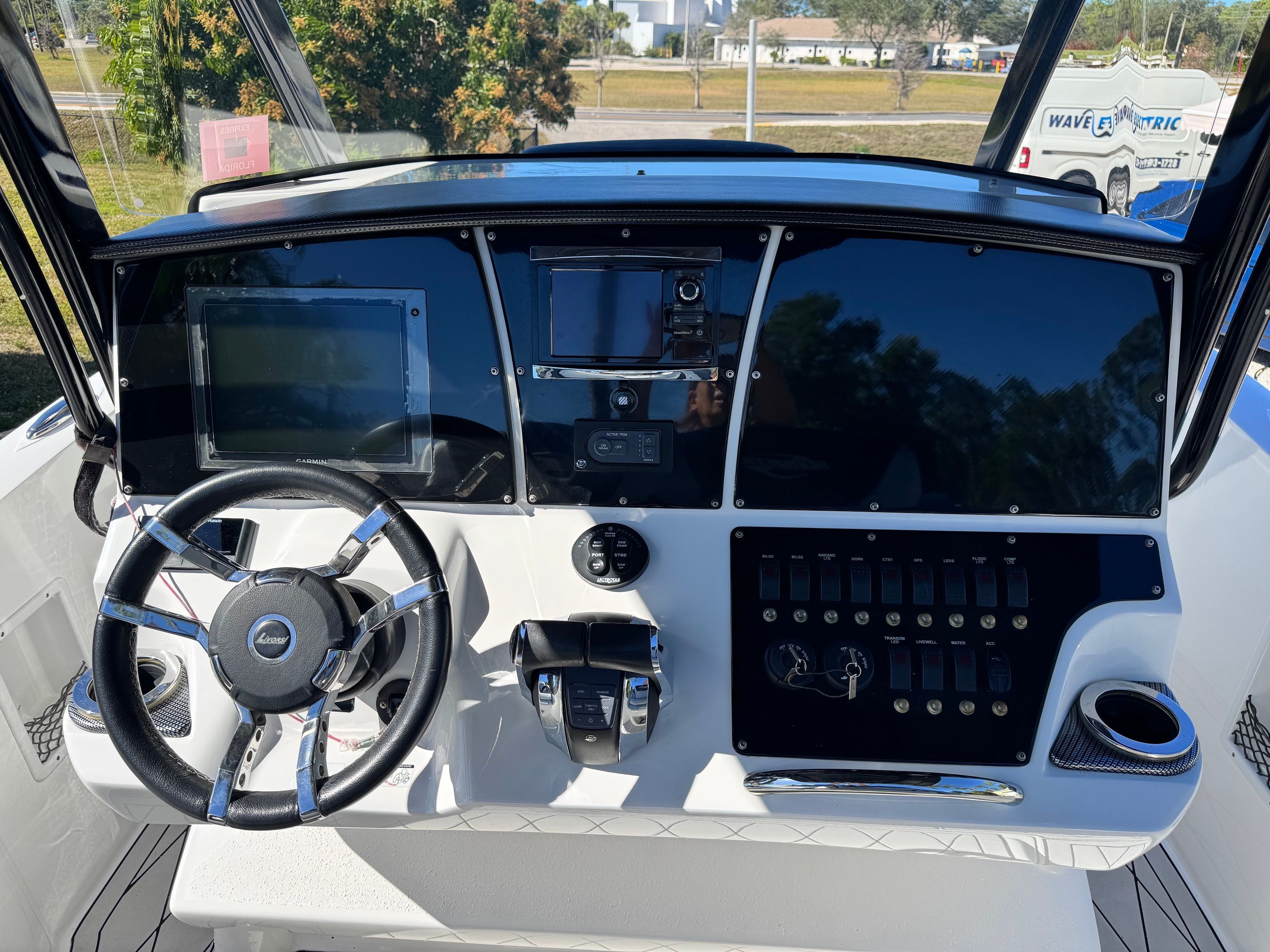 Dashboard of a 2017 Sunsation 32 CCX boat with steering wheel and instruments.
