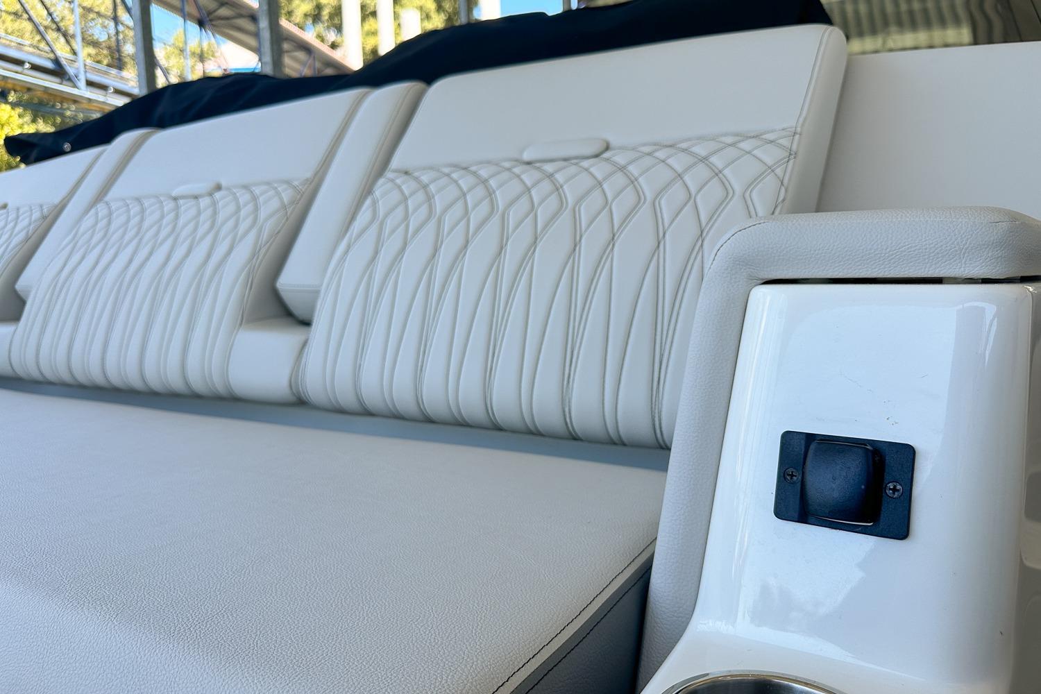2025 Sea Ray Sundancer 370 interior with luxurious white seating and modern design.