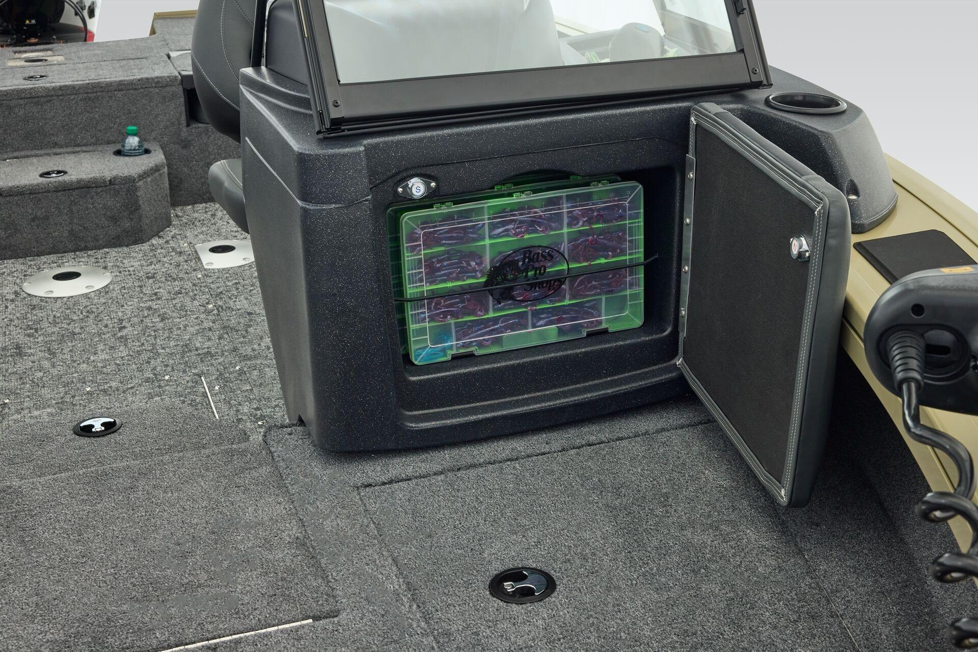 2026 Tracker Targa V-19 Combo boat storage compartment with organized tackle boxes.