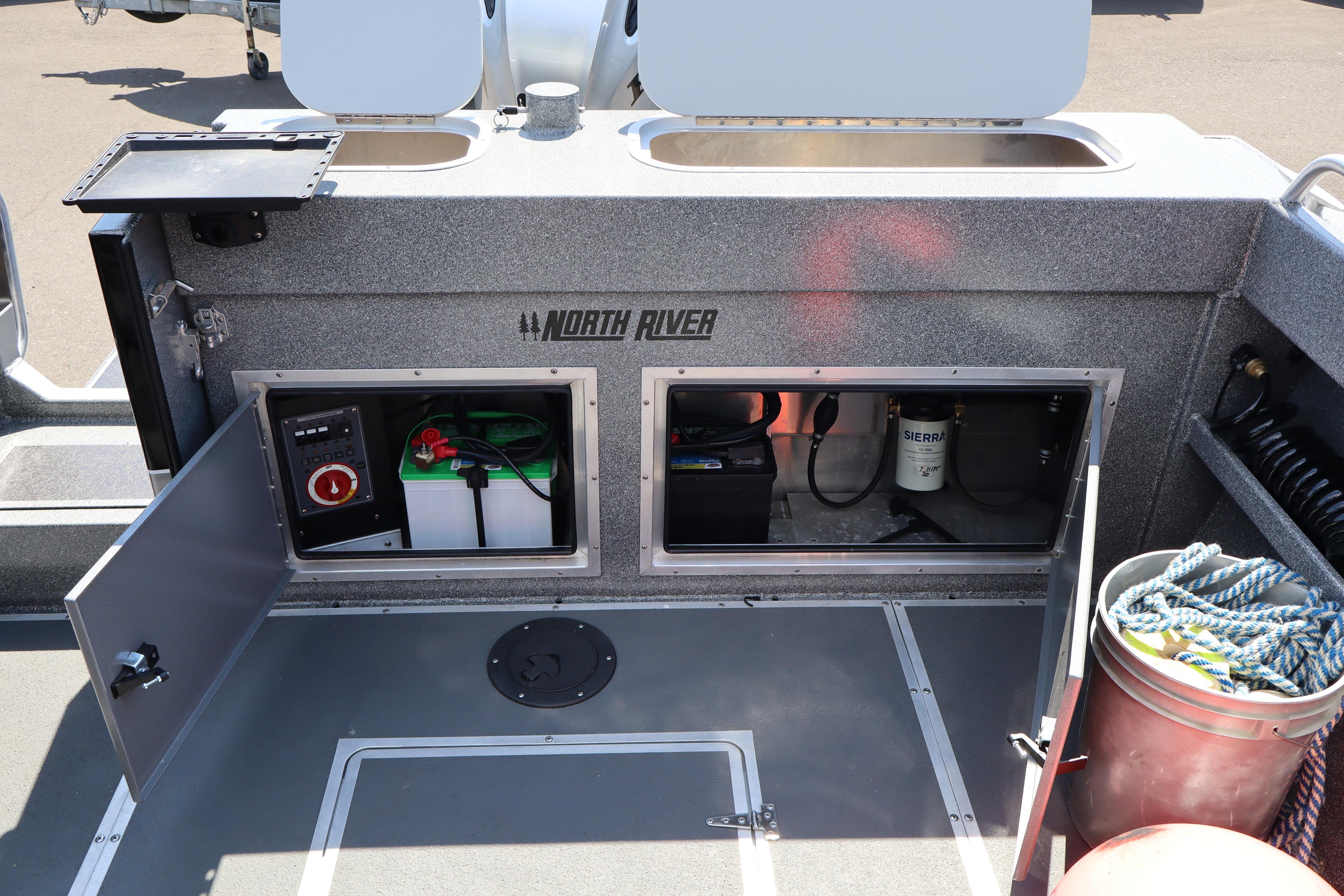 2025 NorthRiver SEAHAWK boat interior showing storage compartments and equipment.