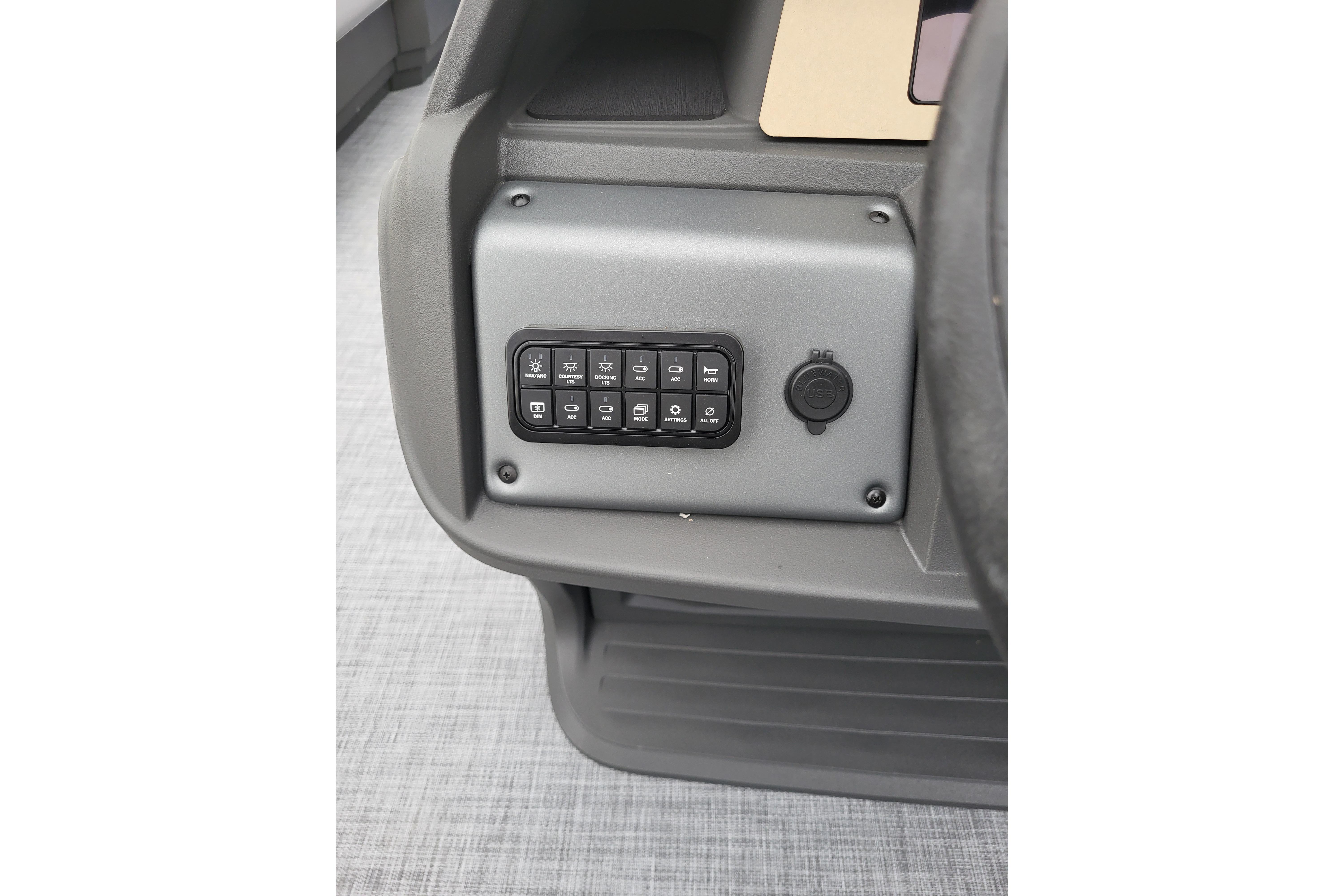 Control panel of 2026 Sun Tracker Party Barge 18 DLX pontoon boat.