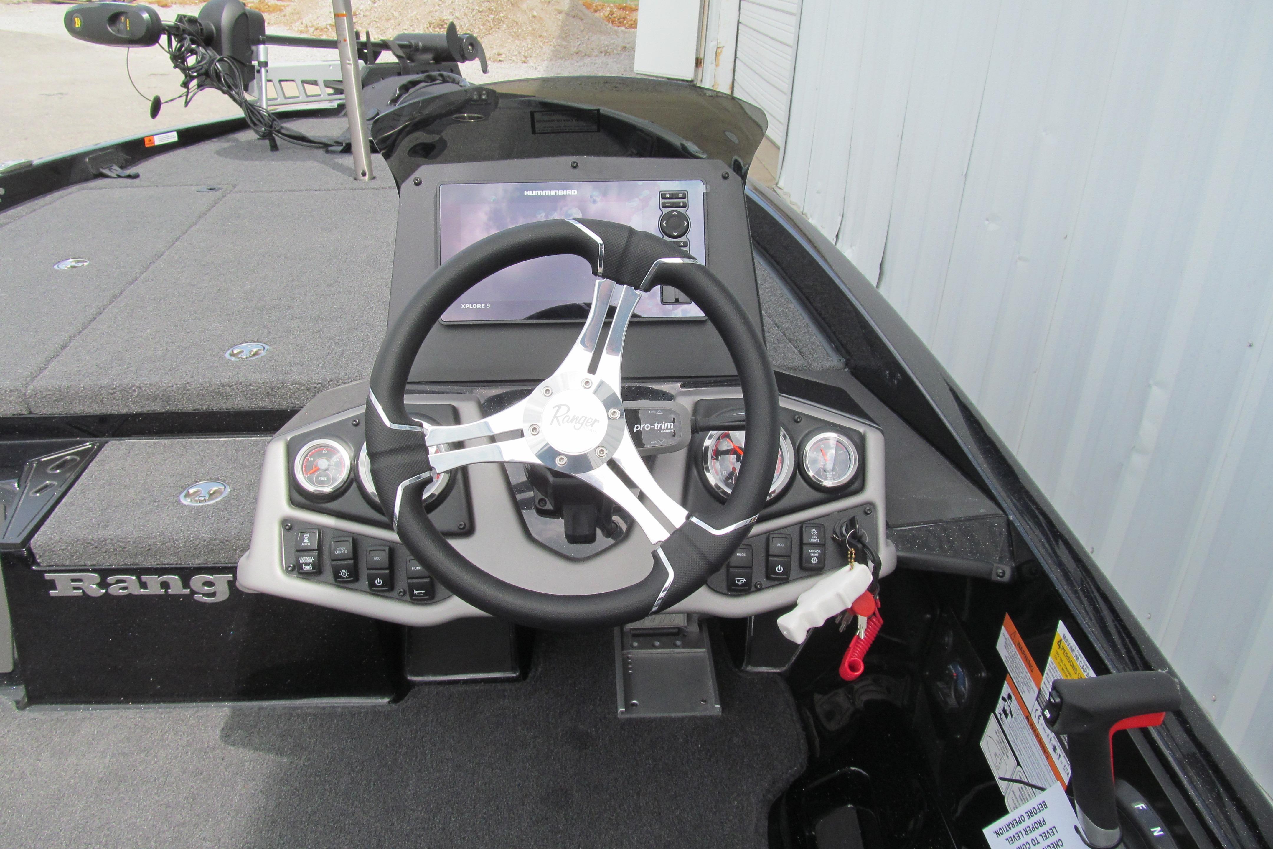 2026 Ranger Z185 boat dashboard with steering wheel and control panel.
