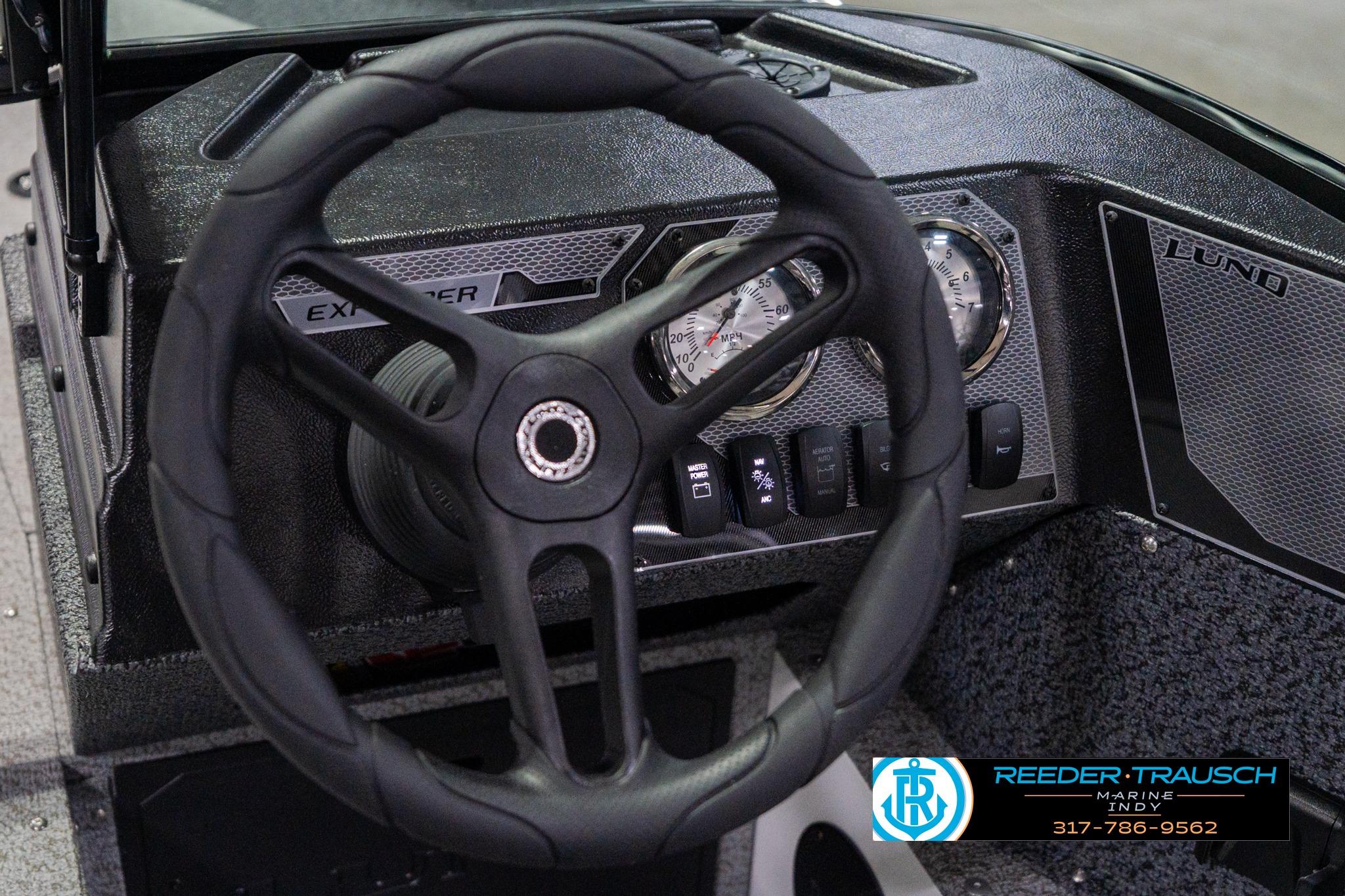 Steering wheel and dashboard of 2026 Lund 1700 Explorer Sport boat.