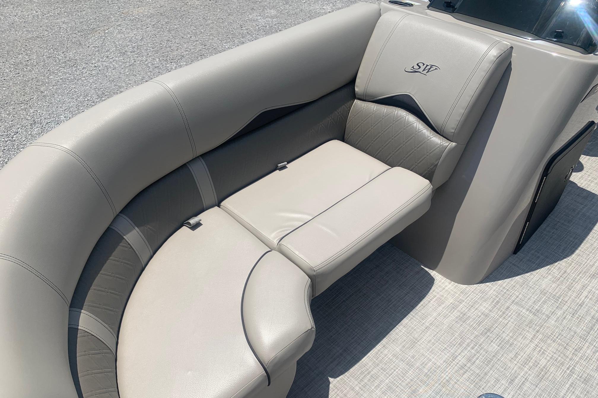 2023 Silver Wave 2410 SW3 CLS boat interior with luxurious gray seating and elegant design.