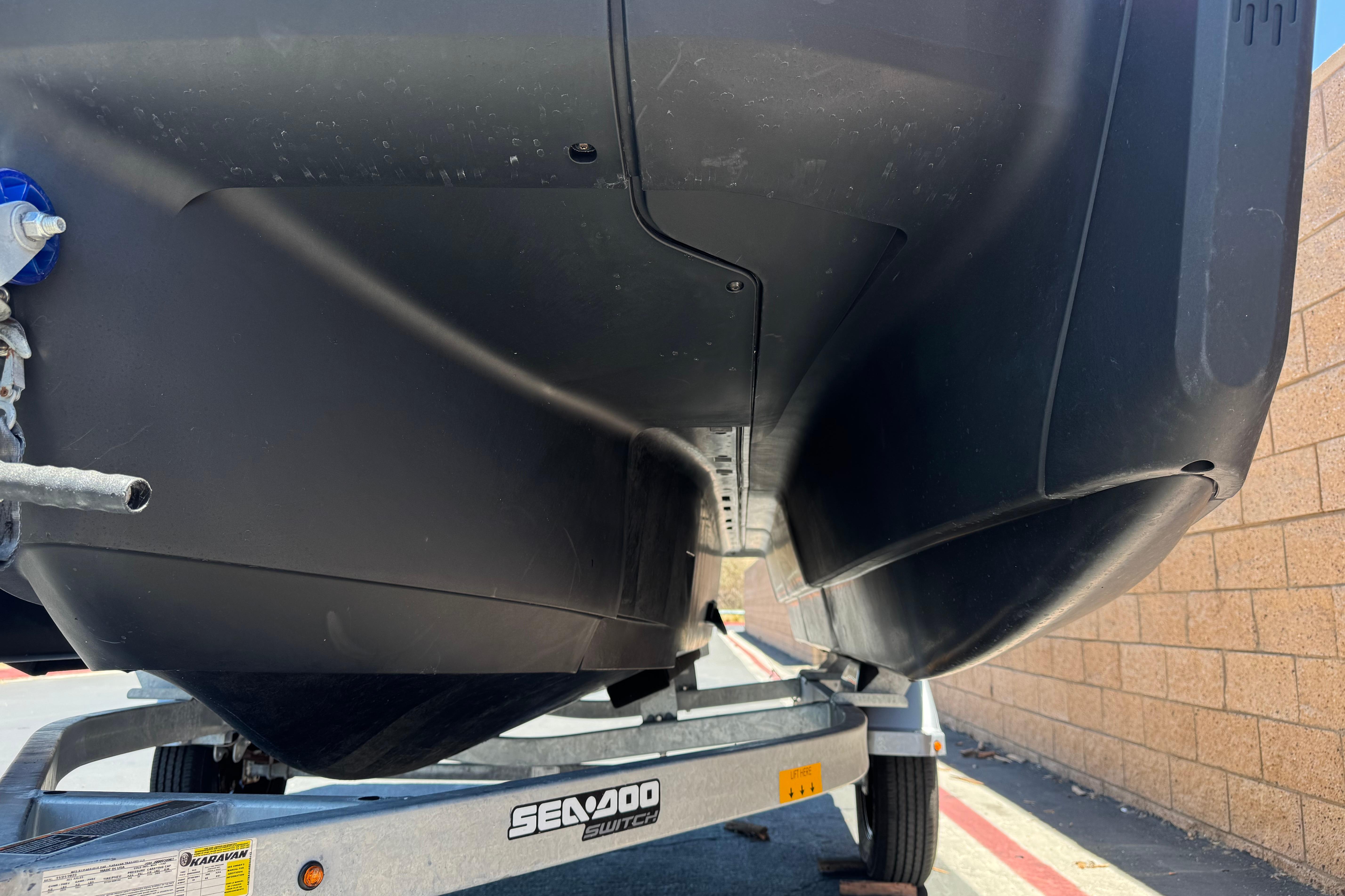 2024 Sea-Doo Switch Compact underside view on trailer, showcasing hull design.
