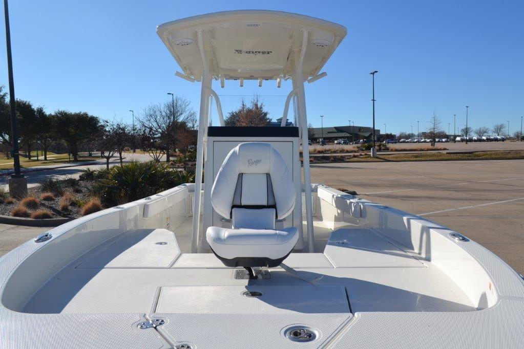 2025 Ranger 2360 Bay boat with center console and seating, parked outdoors.