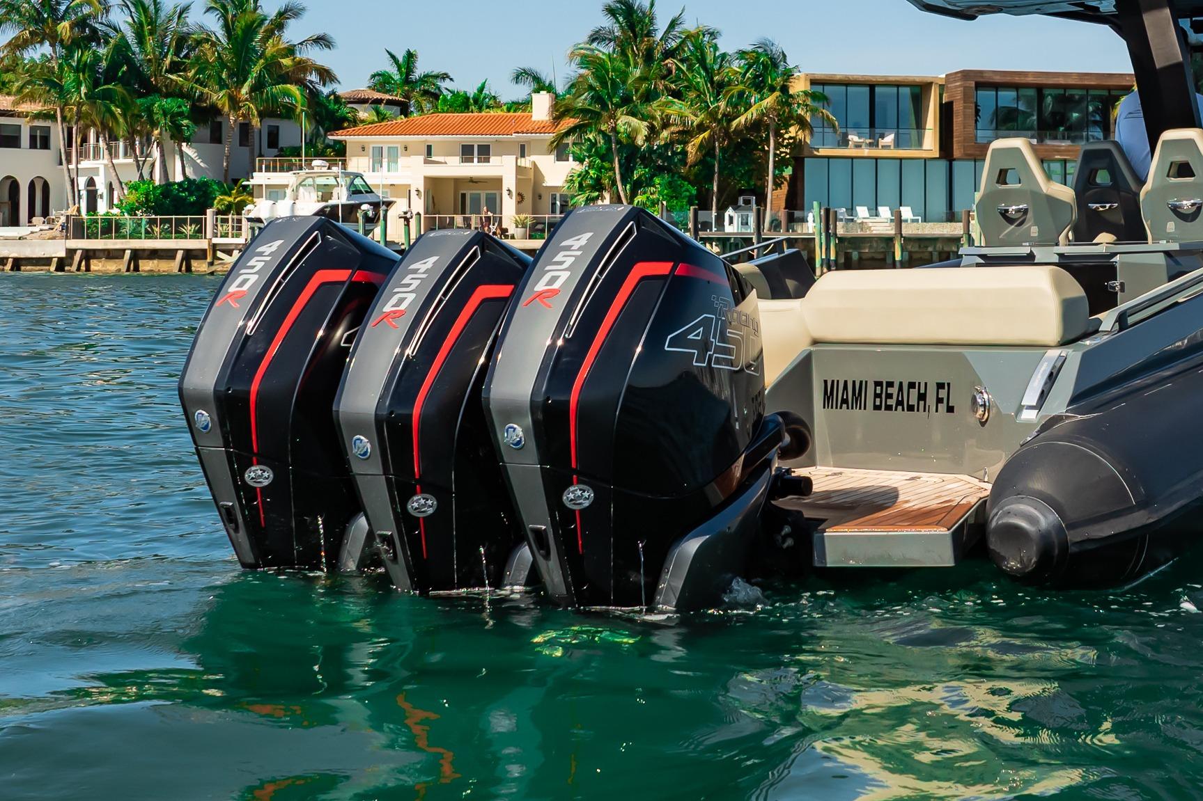 Skipper-BSK 38NC boat with triple outboard engines in Miami Beach, 2023.