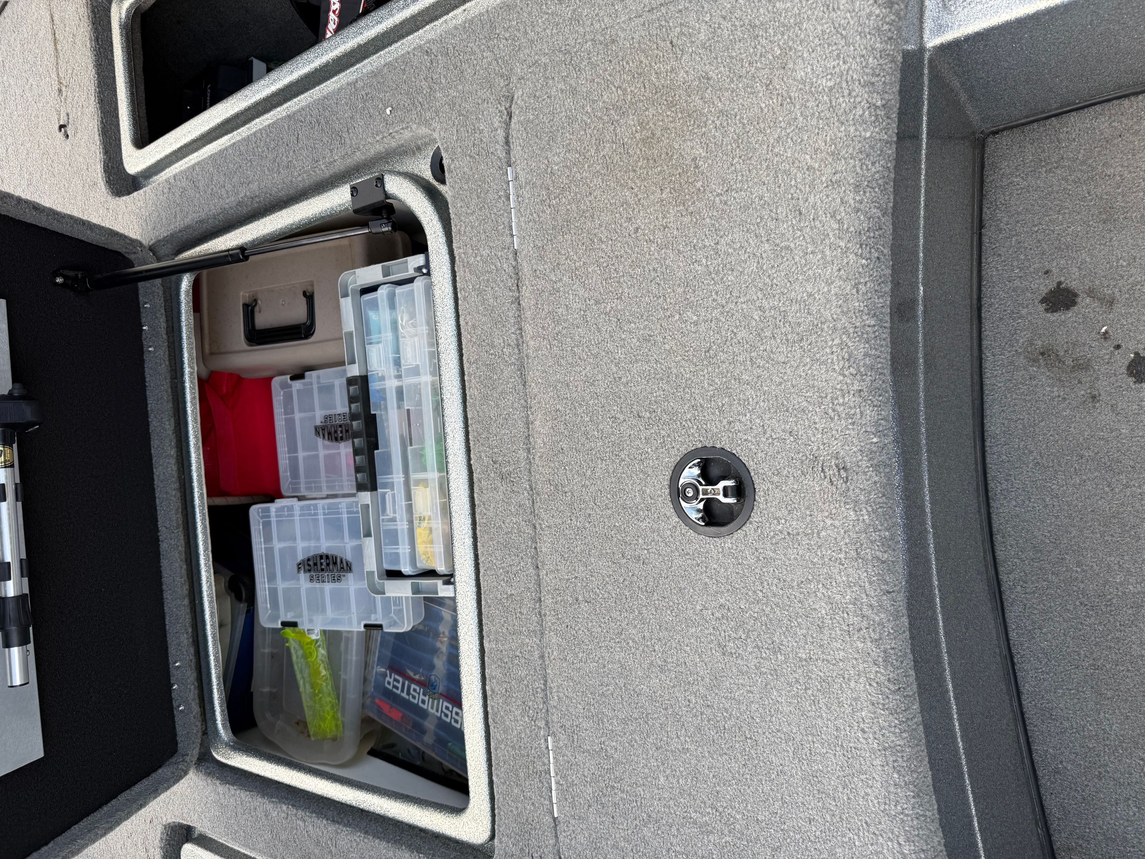 Interior view of a Nitro NX 898 DC boat with fishing gear.