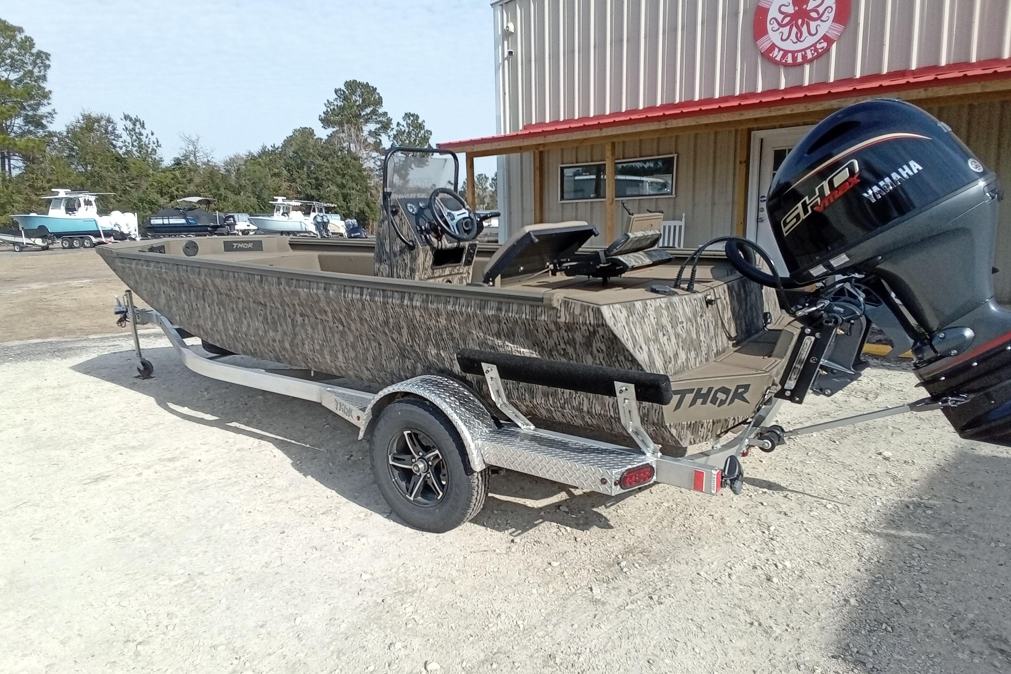 2026 Thor 1900 Low Country Elite boat with Yamaha engine on trailer.