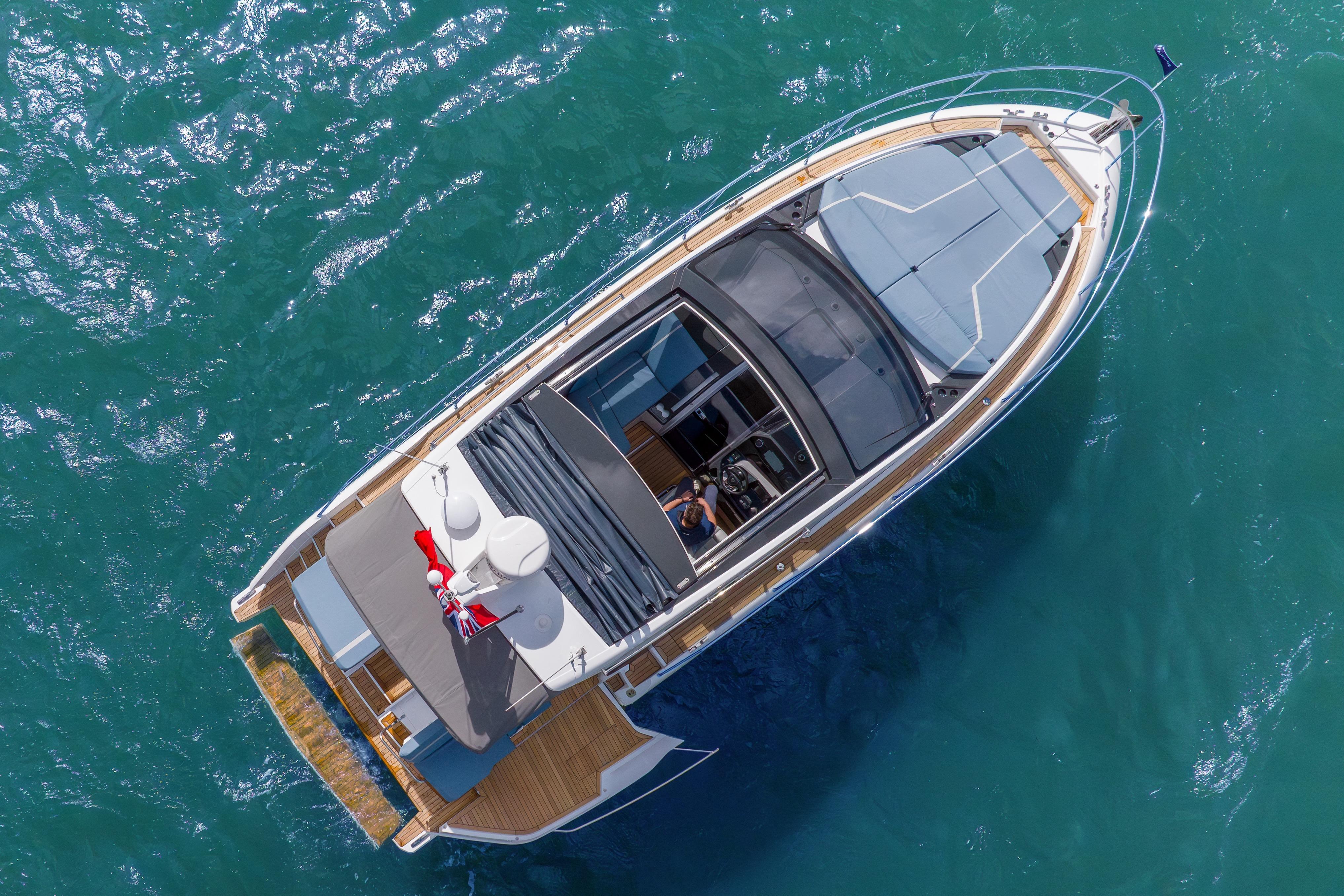 Aerial view of 2026 Fairline Targa 40 yacht cruising on blue ocean waters.
