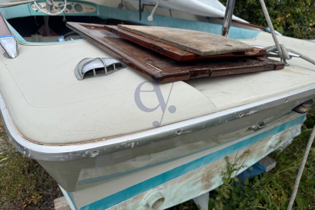 1972 Riva Rudy boat with vintage dashboard and wooden panels, showing signs of wear.