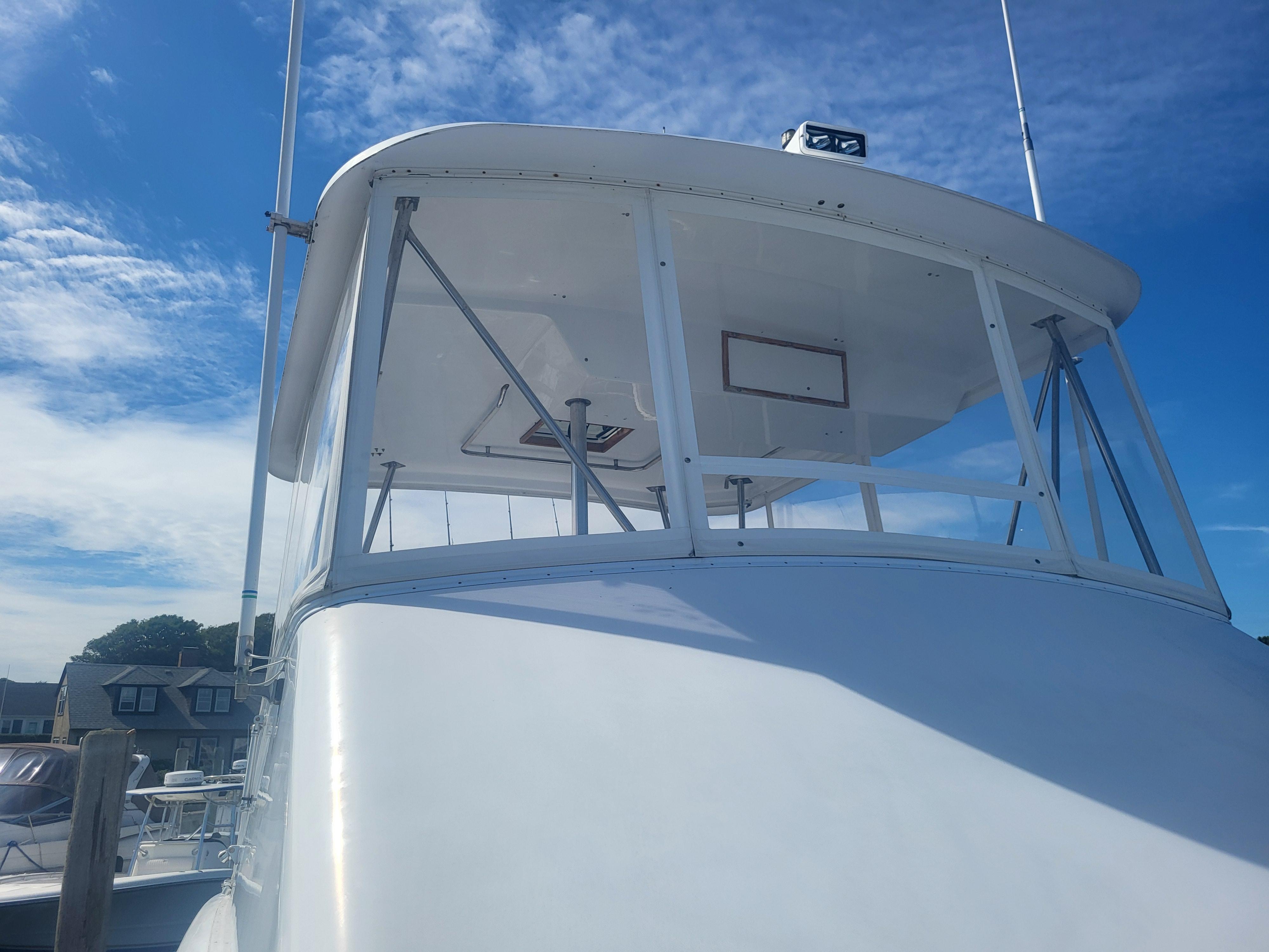 1989 Ocean Yachts 48 boat with clear blue sky background.