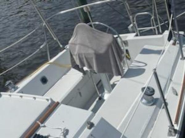 Cockpit of a 1988 O'Day 272 LE sailboat on water.