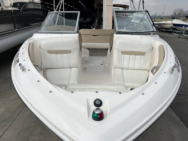 2013 Regal 1900 boat with white interior and bow seating.