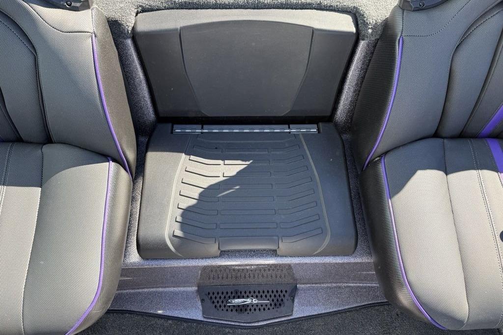 Interior seating of 2026 Skeeter ZXE21 boat with black and purple accents.