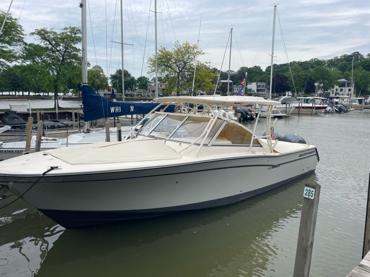 2019 Grady-White Freedom 307 boat docked in marina.