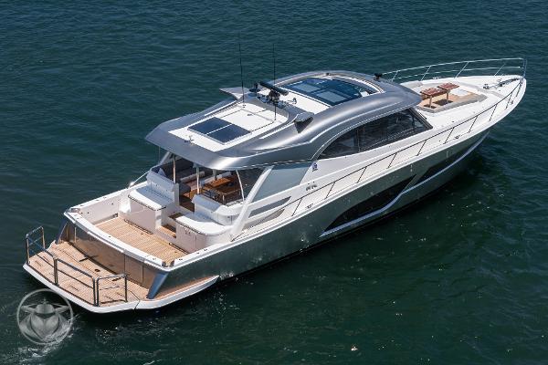 2025 Riviera 645 SUV luxury yacht on open water.
