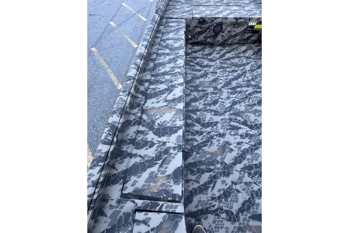 2025 Havoc 1860 boat interior with camouflage pattern flooring.