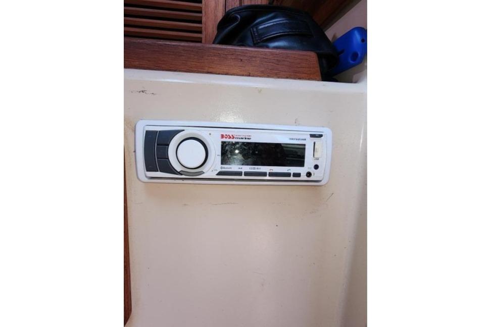 Boat interior with a Boss stereo system, Wasque Down East Cruiser, 1985 model.