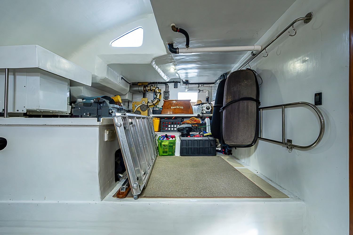 Interior of 2014 Marlow 80 Explorer yacht, featuring storage and equipment area.