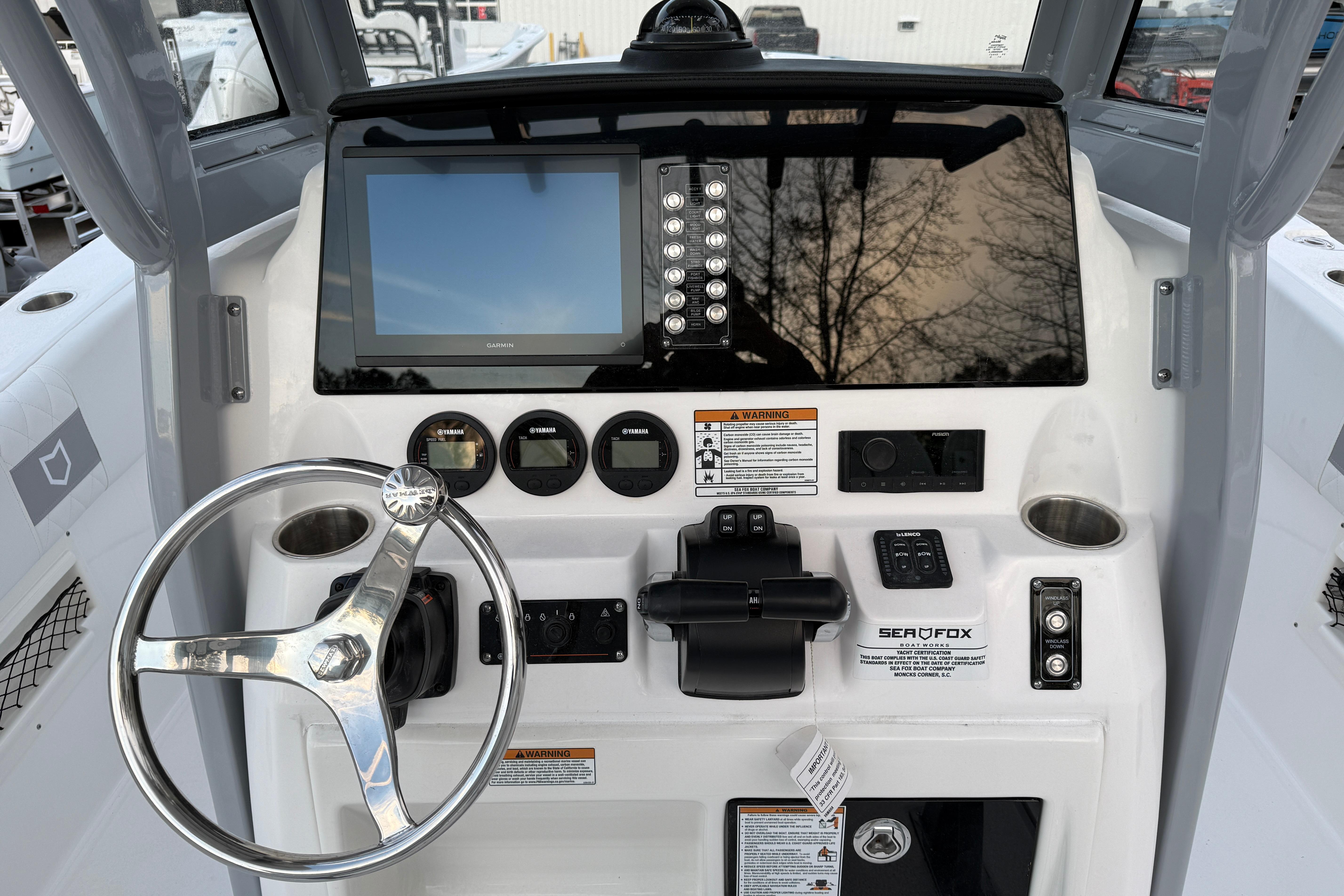 2026 Sea Fox 268 Commander dashboard with steering wheel and navigation controls.