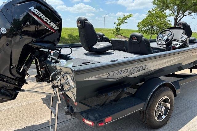 2026 Ranger RT188 boat with Mercury engine on trailer, parked outdoors.