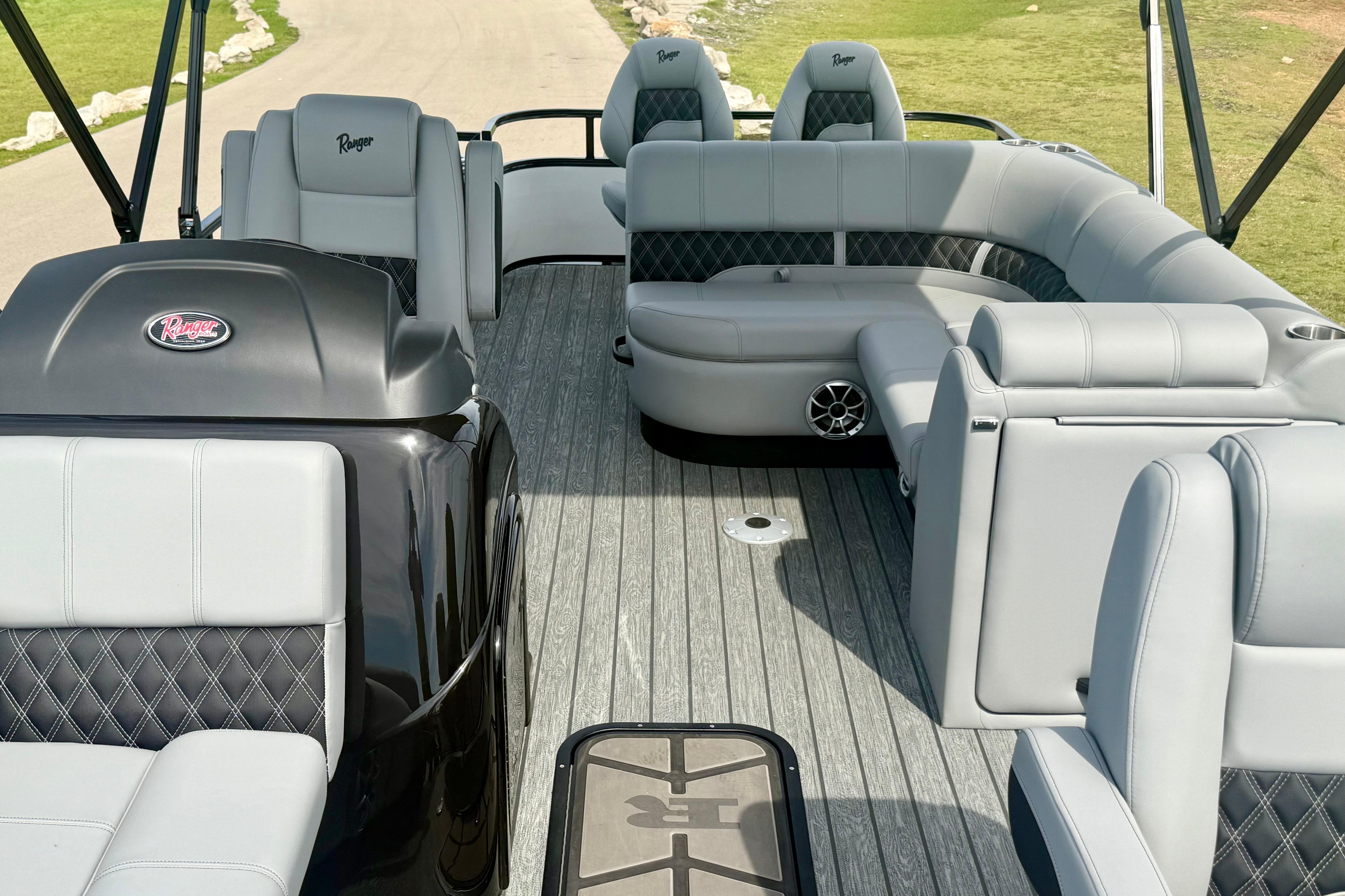 2026 Ranger 223FC boat interior with gray seating and modern design.