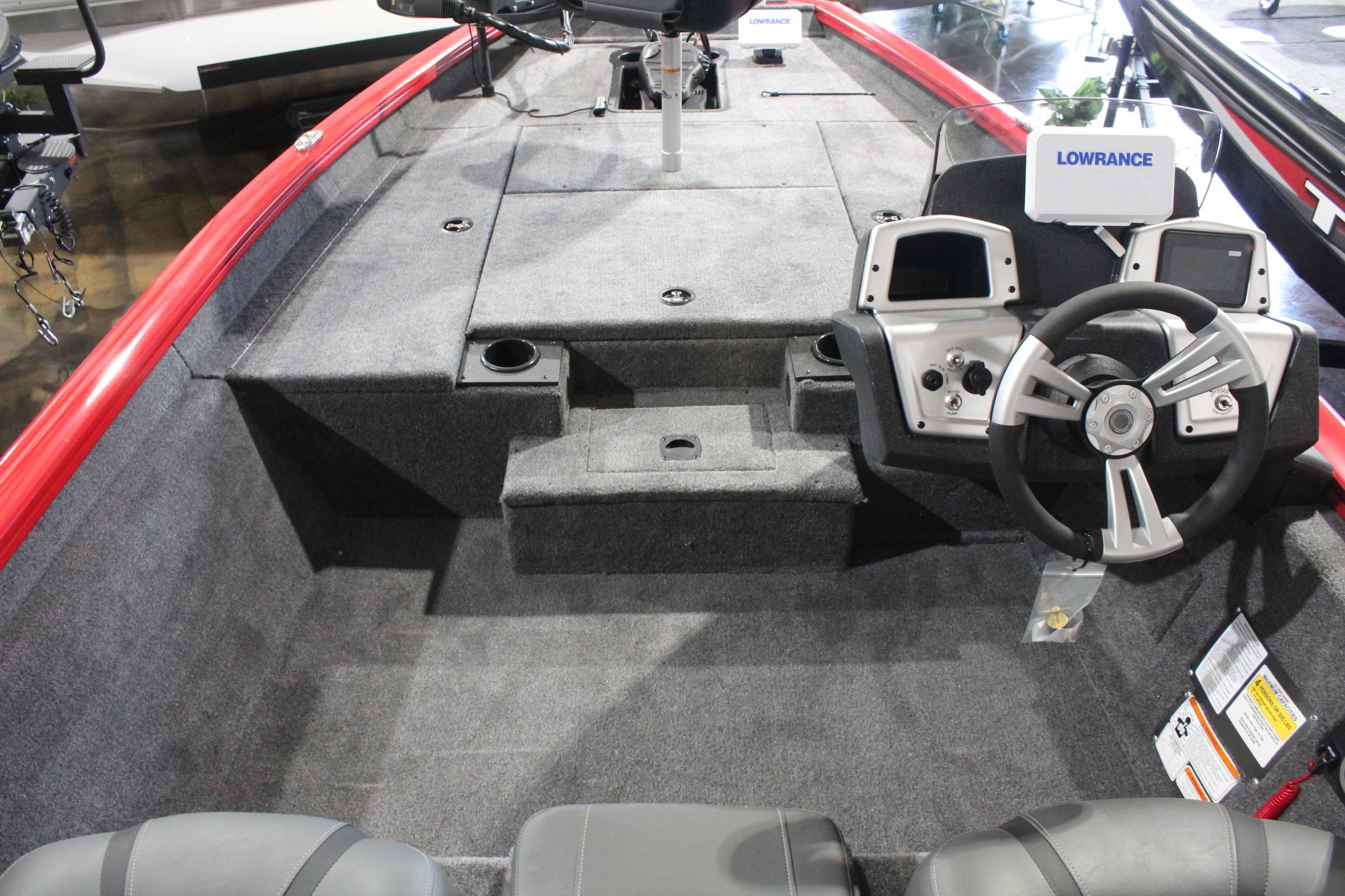 2026 Tracker Pro Team 175 boat interior with steering wheel and control panel.