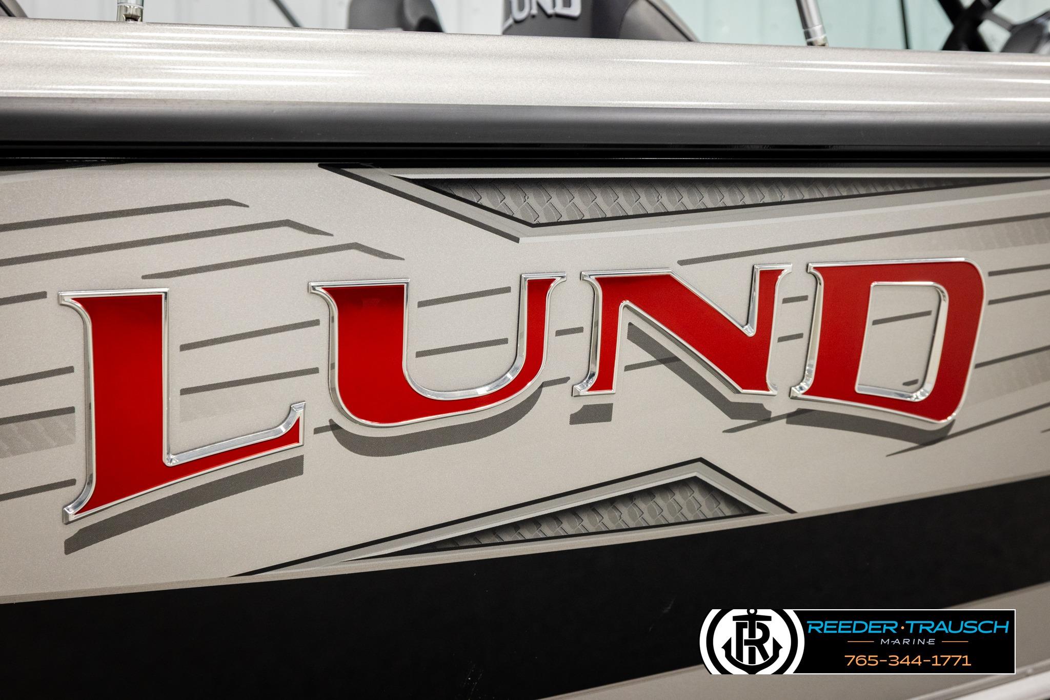 Close-up of 2026 Lund 1975 Tyee boat logo with sleek design details.