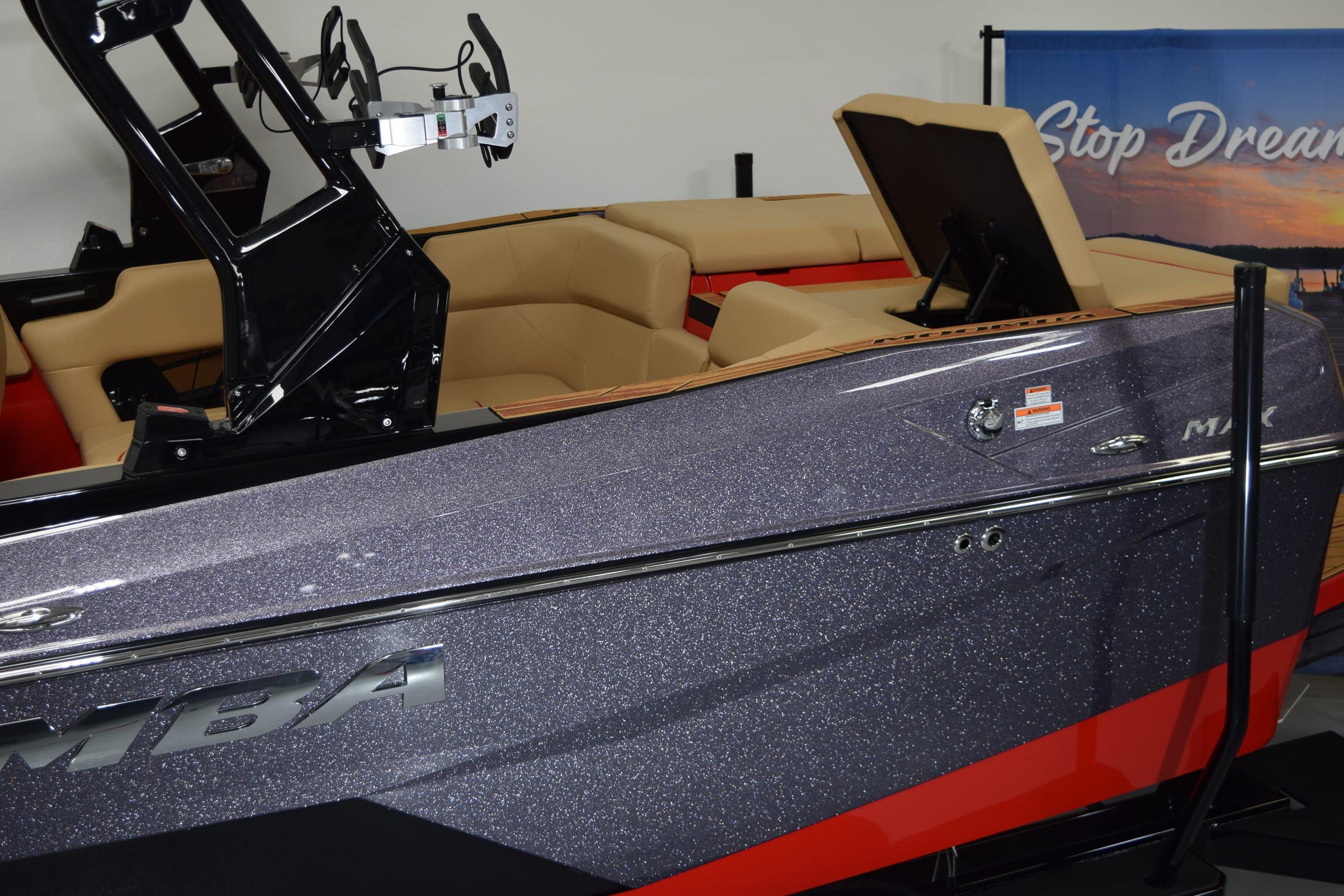 2026 Moomba Max boat with sleek design and luxurious interior seating.