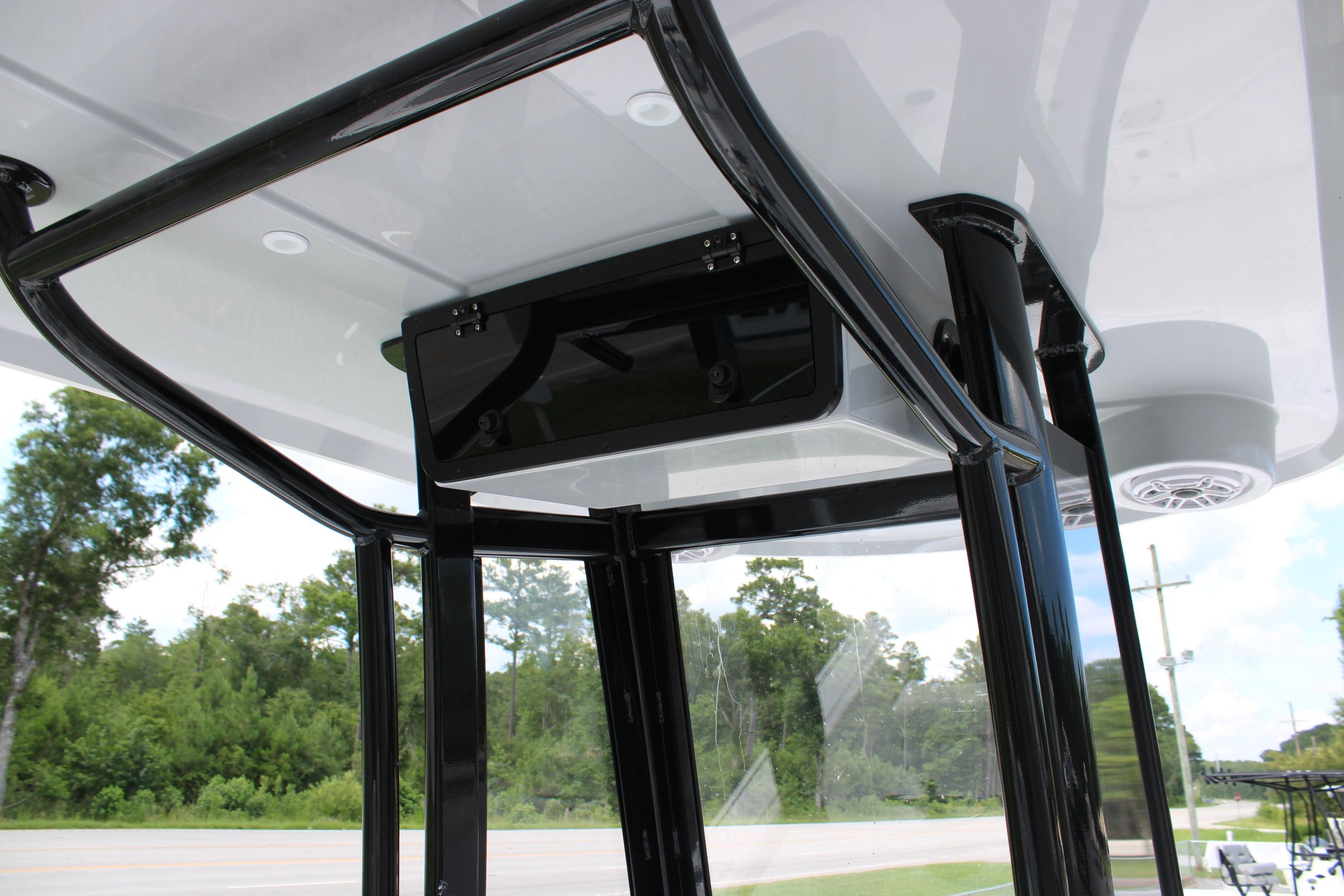 2027 Blazer Bay Makaira 2800 T-top structure with sleek black frame and overhead console.