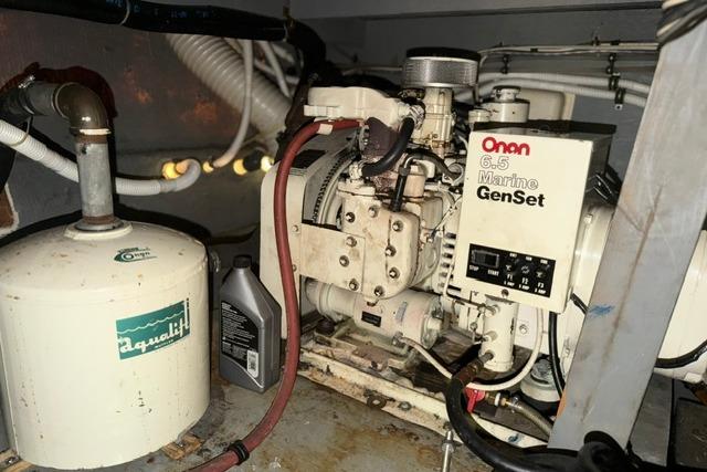 Engine room of 1980 Chris-Craft 381 Catalina with Onan 6.5 Marine GenSet generator.