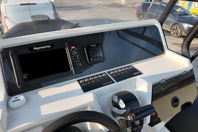 Dashboard of 2026 Northstar VEGA 6.4 boat with Raymarine navigation system.
