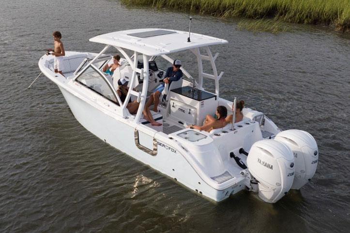 Manufacturer Provided Image: 2025 Sea Fox 268 Traveler boat with passengers on a calm waterway.
