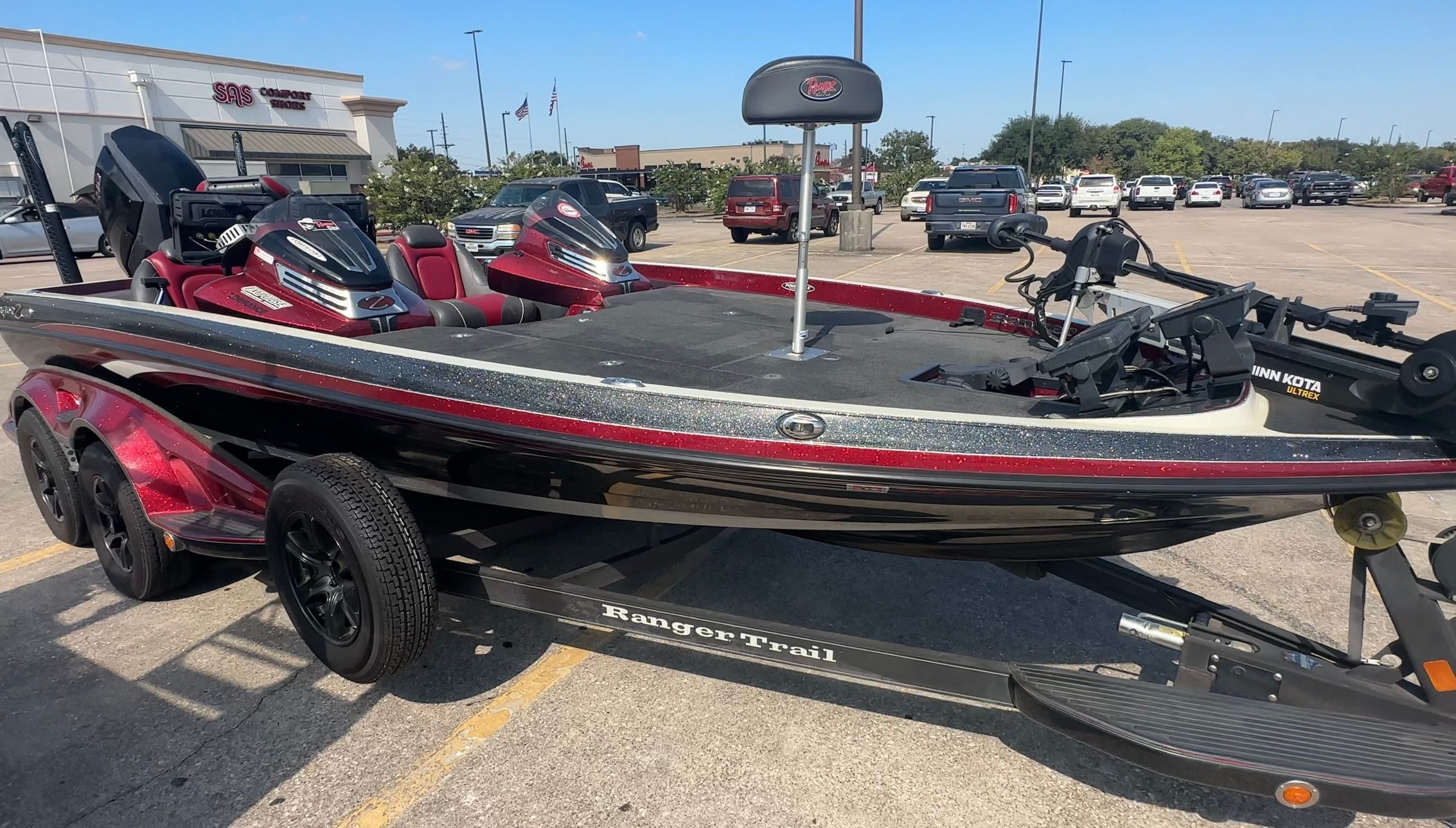 2017 Ranger 520C bass boat on trailer in parking lot.