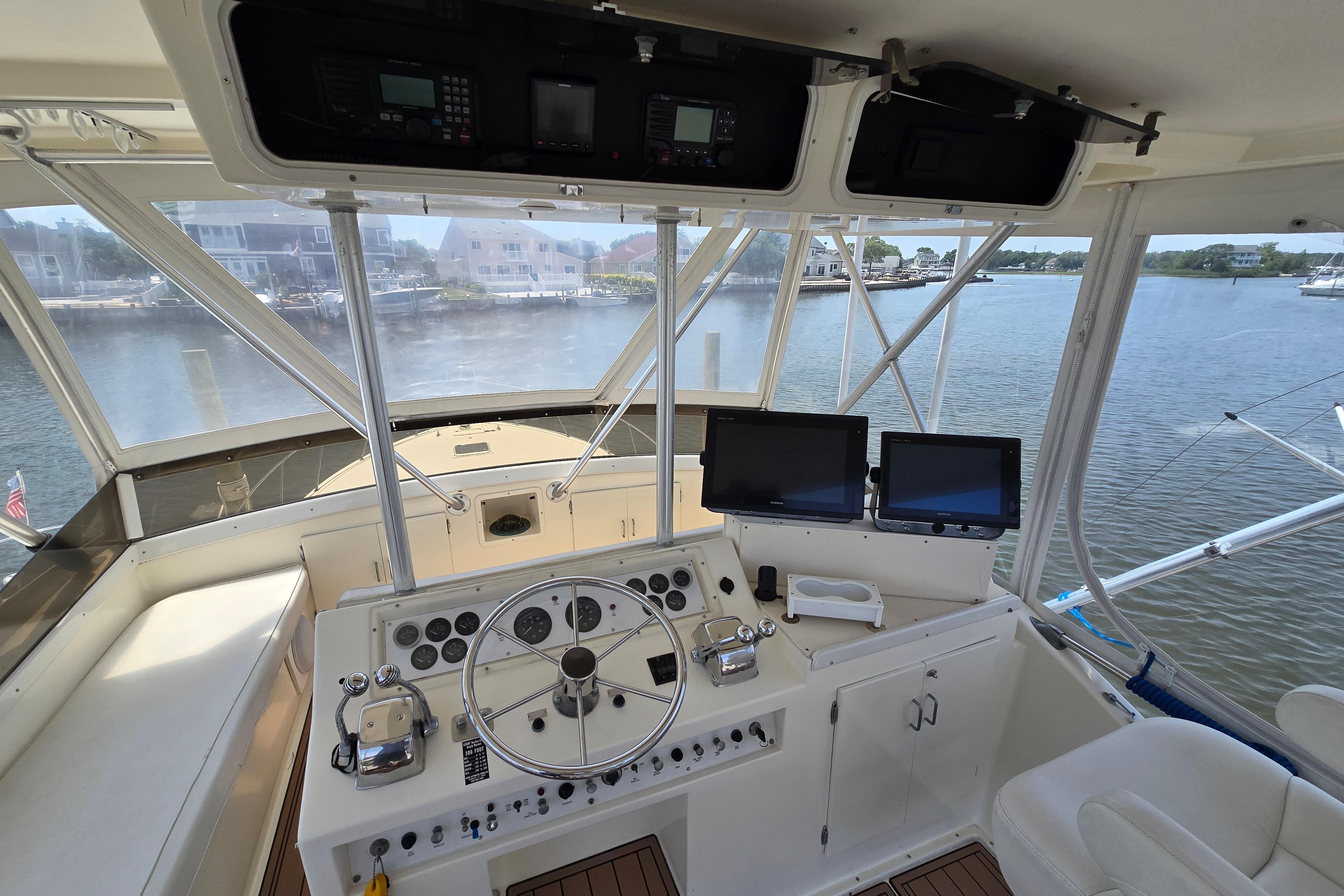 Interior view of 1988 Post 46 Convertible yacht cockpit with navigation equipment.