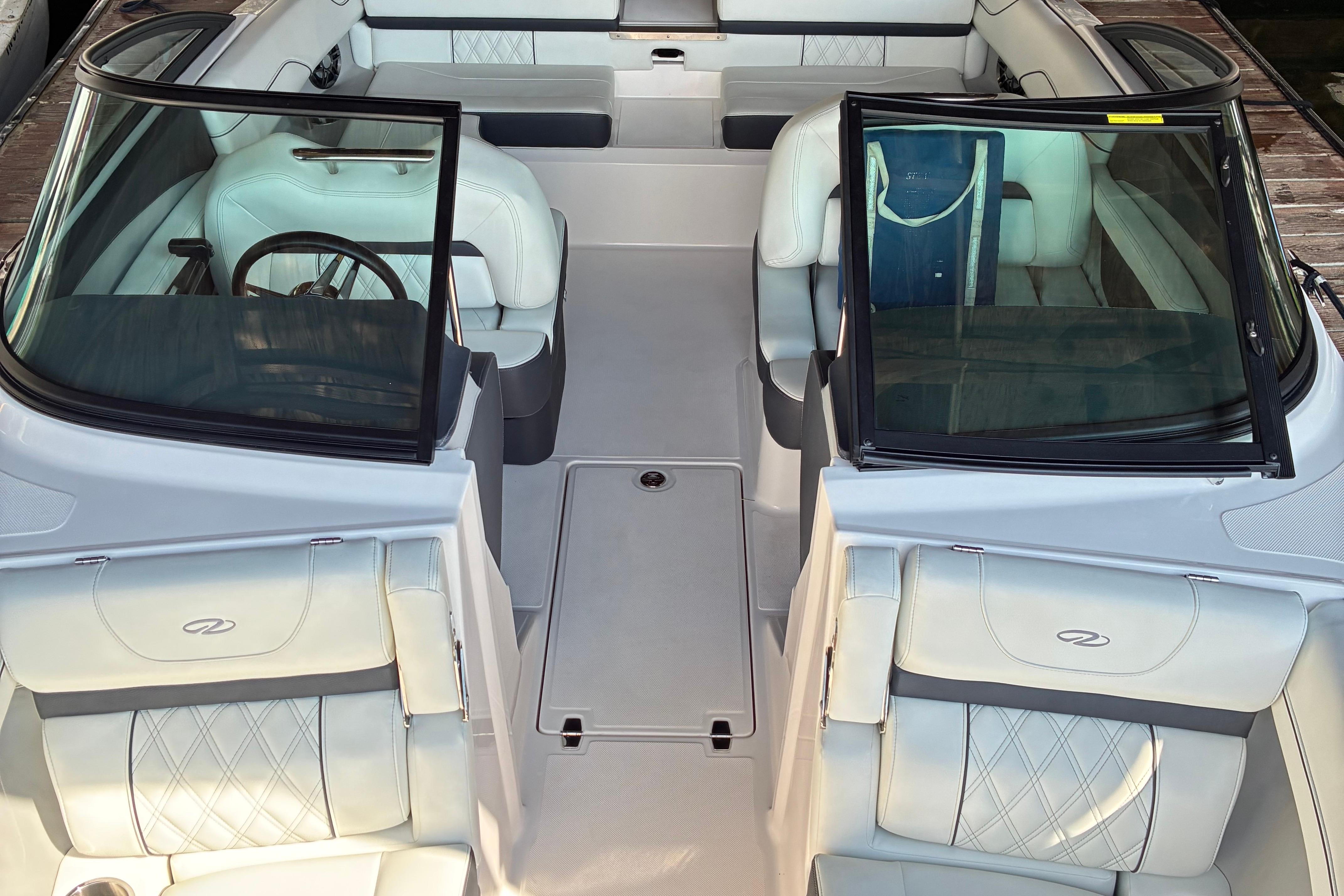 2025 Regal LS2 boat interior with luxurious white seating and sleek design.