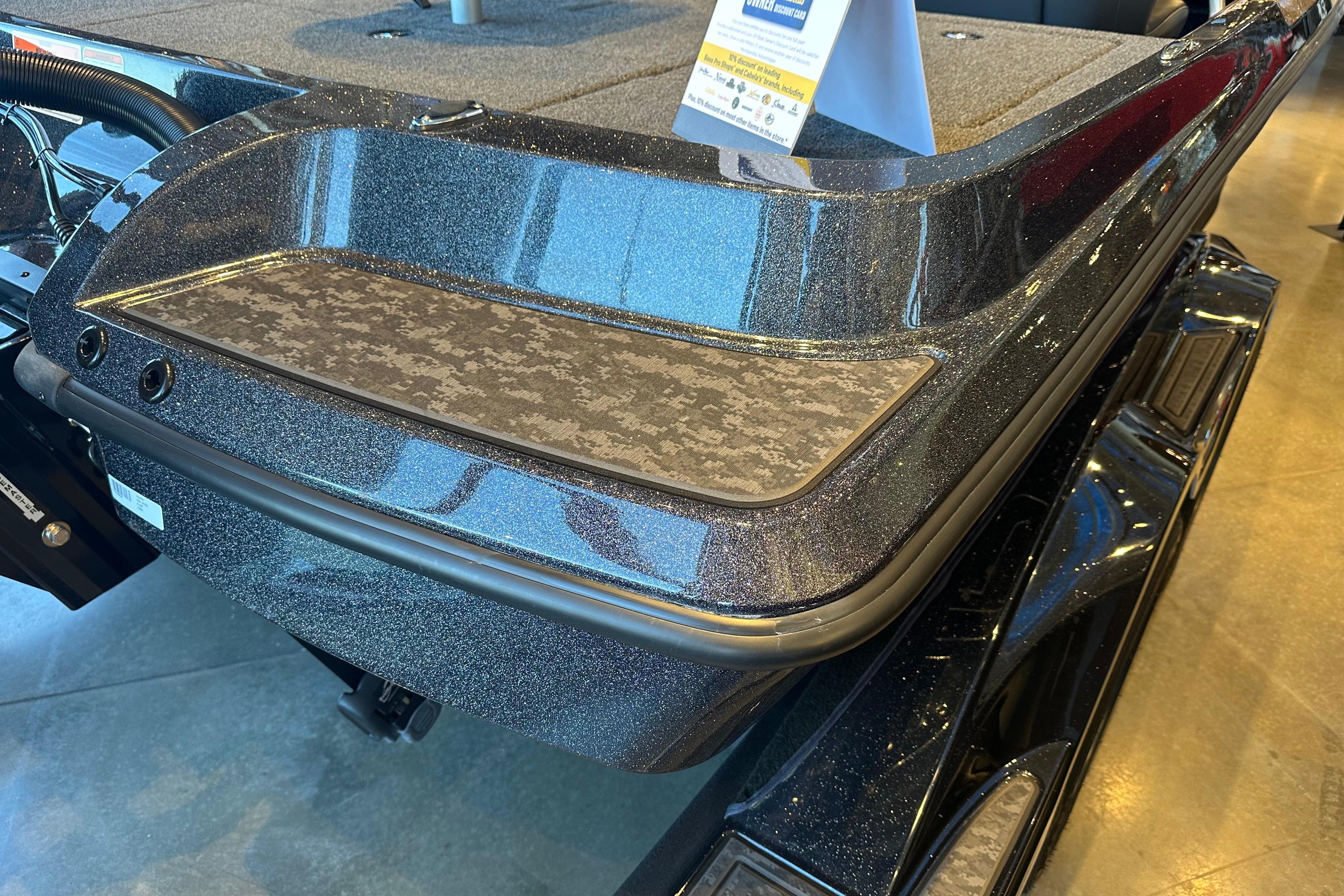 2026 Nitro Z19 XL boat with sleek, metallic finish on display in showroom.
